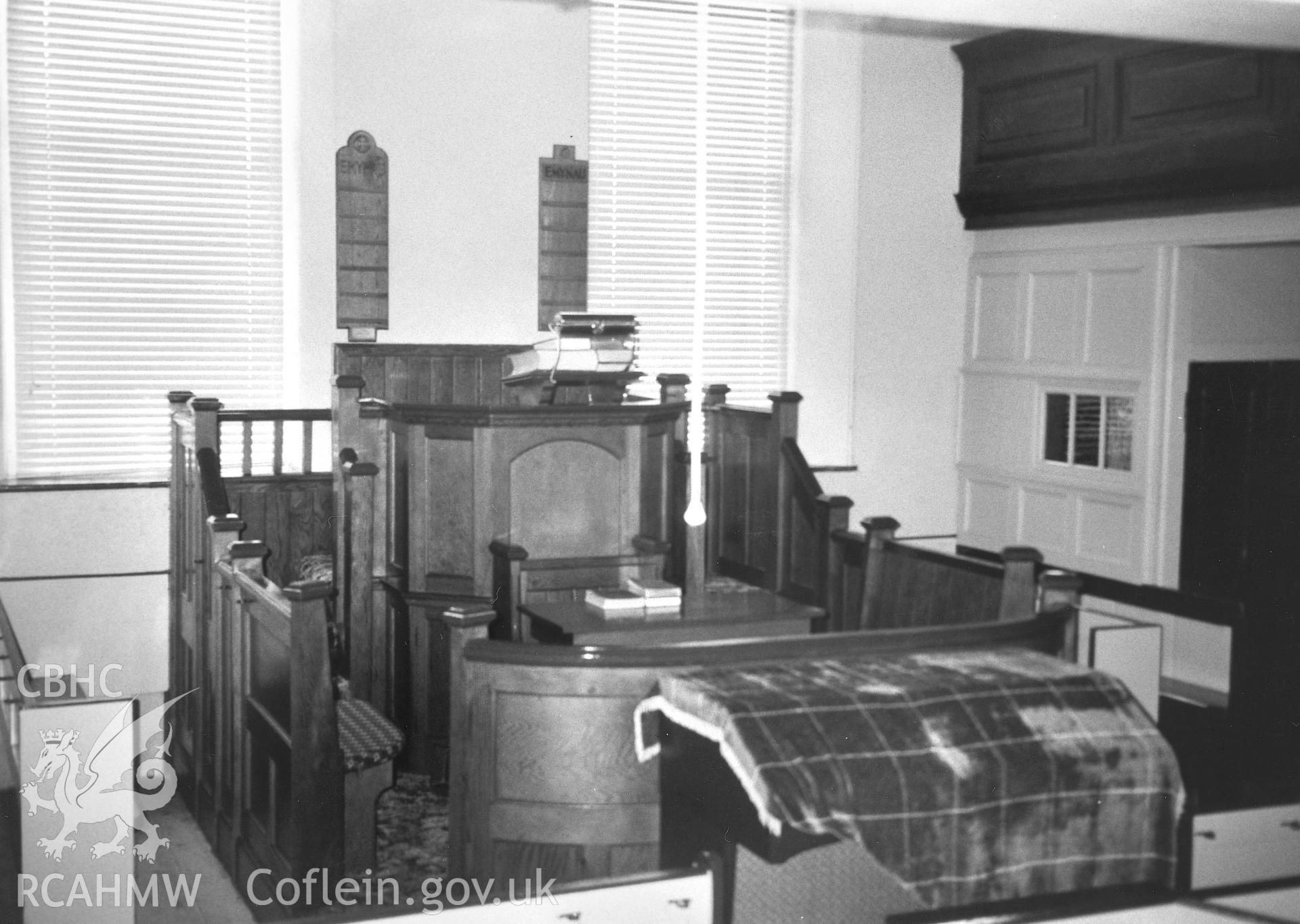 Digital copy of a black and white photograph showing an interior view of Nanternis Independent Chapel, taken by Robert Scourfield, 1995.