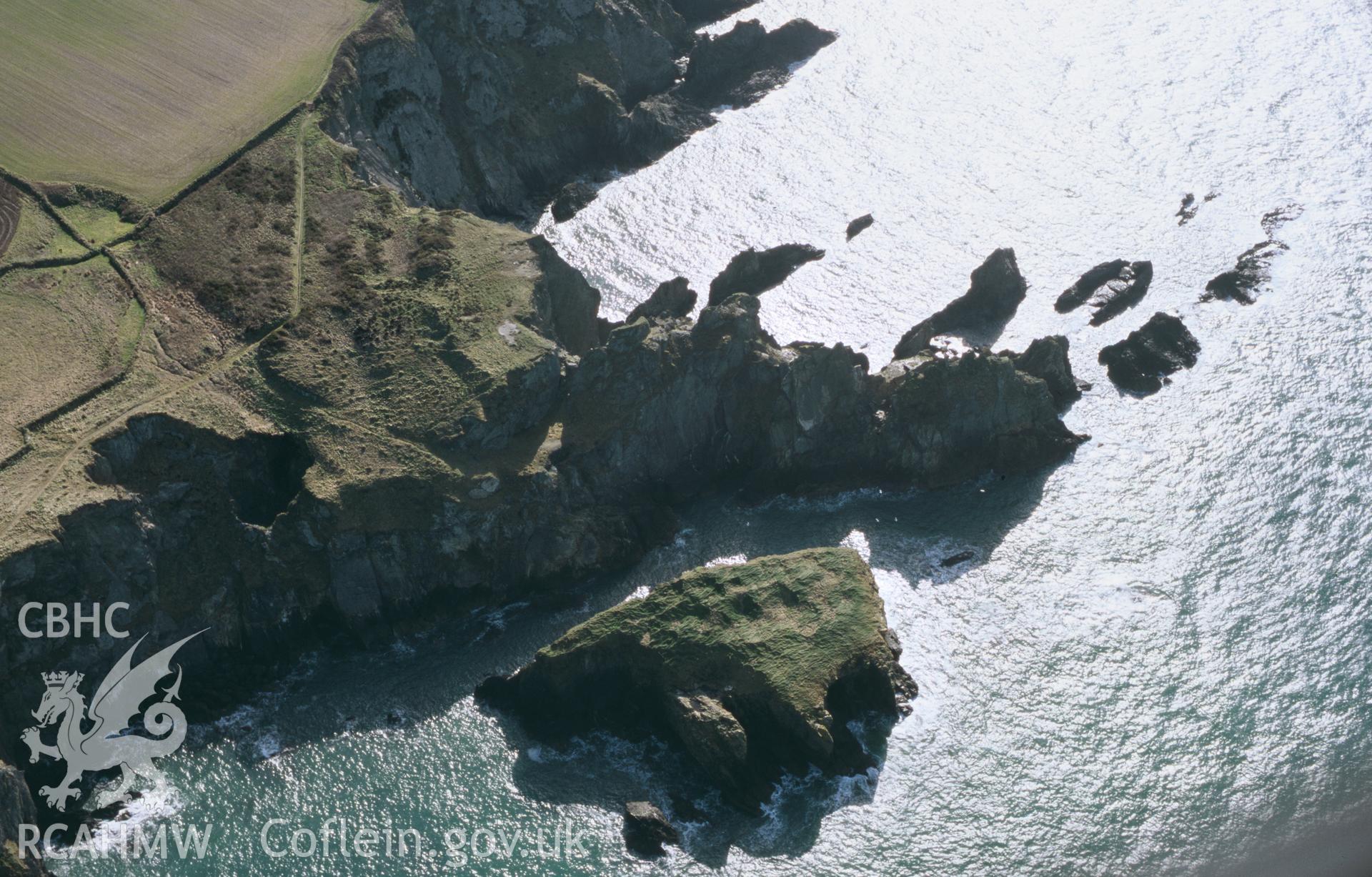 Slide of RCAHMW colour oblique aerial photograph of Castell Coch, St Davids,  taken by Toby Driver, 2002.