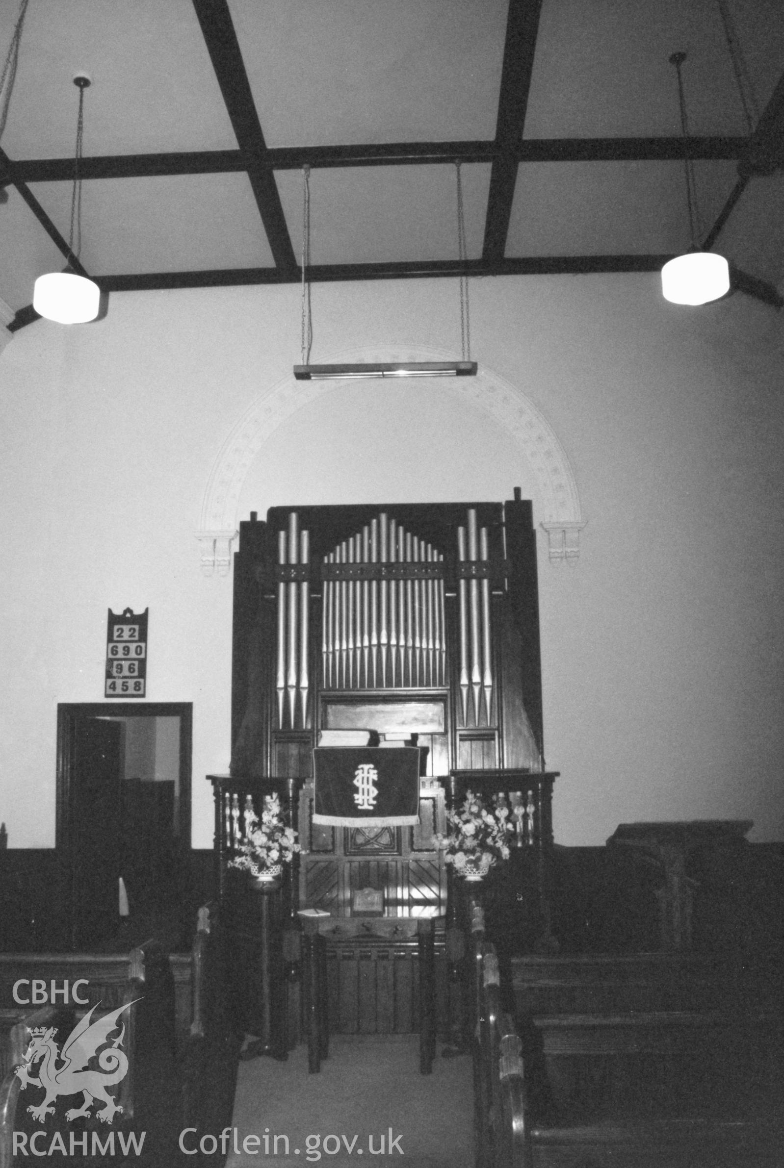 Digital copy of a black and white photograph showing interior view of Keystone Independent Chapel, Camrose, taken by Robert Scourfield, 1996.