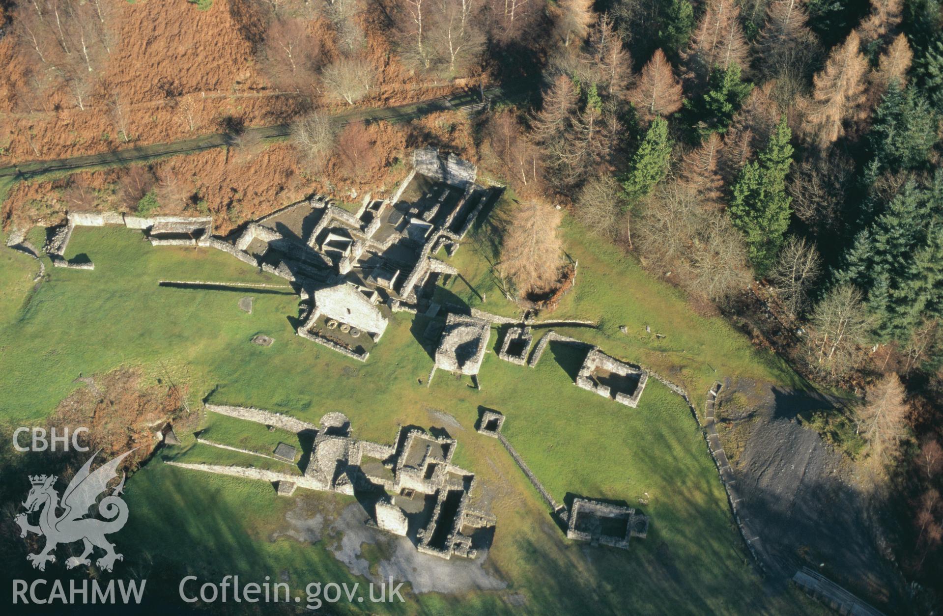 Slide of RCAHMW colour oblique aerial photograph of Bryntail Lead Mine, taken by C.R. Musson, 20/12/1998.