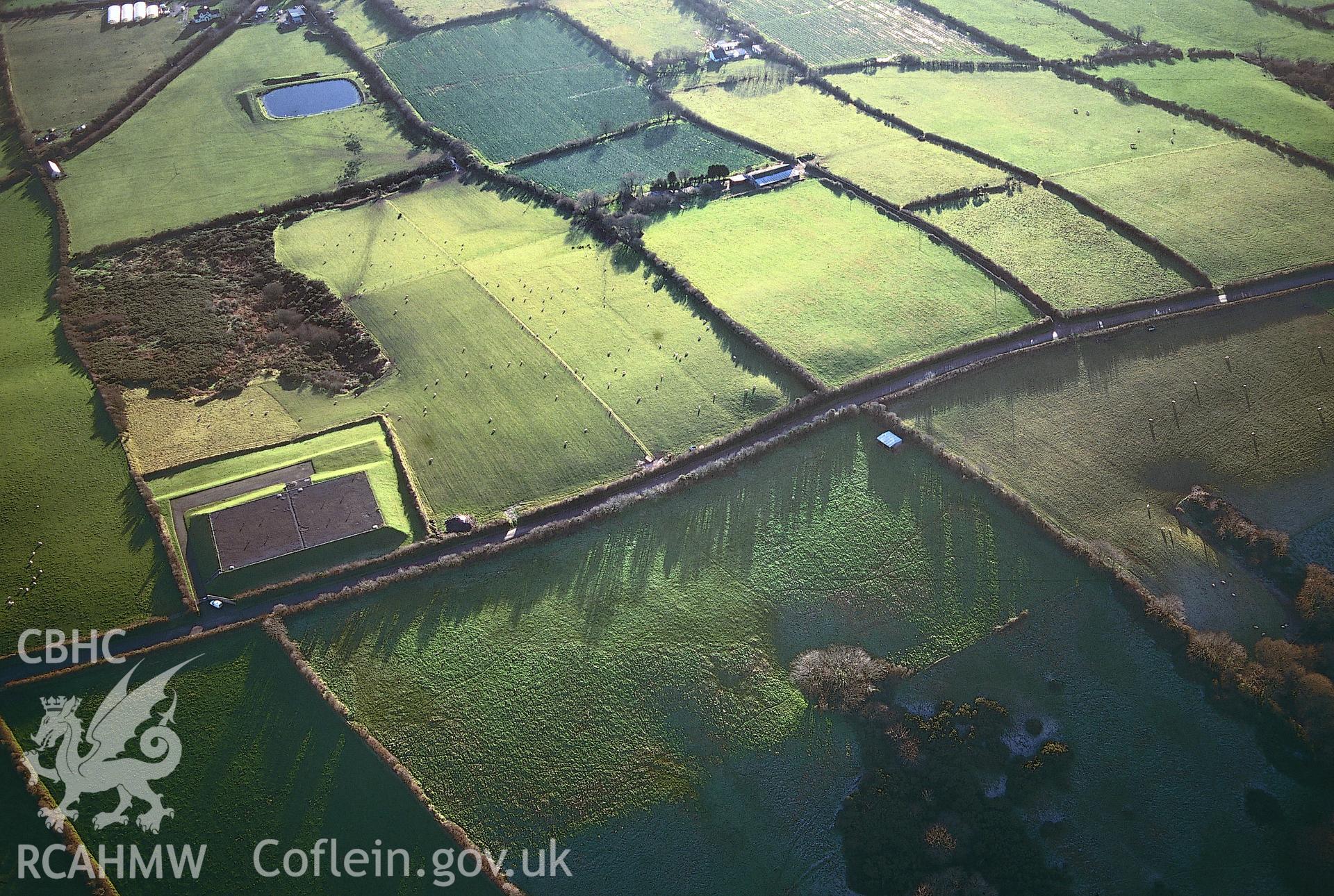 RCAHMW colour slide oblique aerial photograph of Bier Hill; White Hill; Sun Hill, Barrow III, Manorbier, taken by T.G.Driver on the 03/12/1997