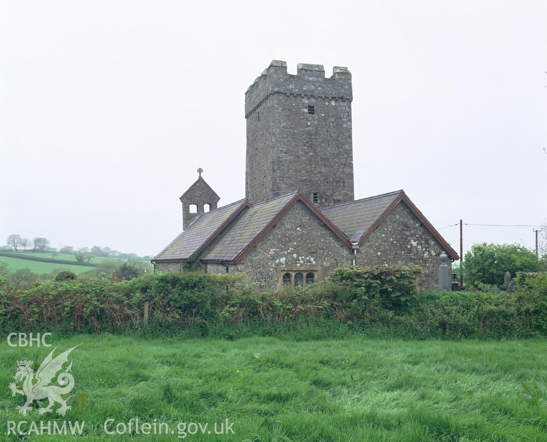 Colour transparency showing an exterior view of Cyffig Church, produced by Iain Wright, June 2004.