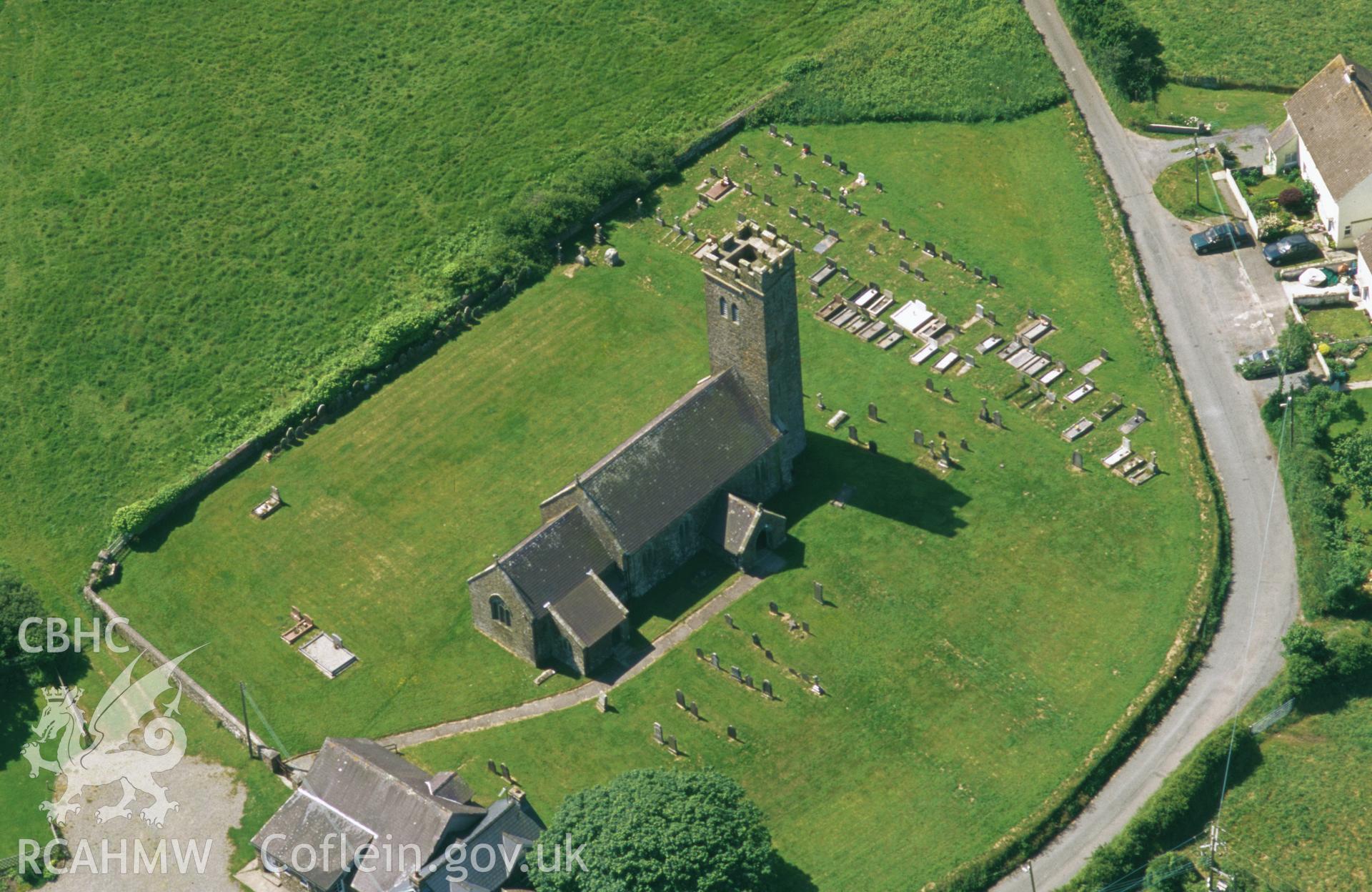 RCAHMW colour slide aerial photograph of St. James' Church, Walwyn's Castle. Taken by Toby Driver on 13/06/2003