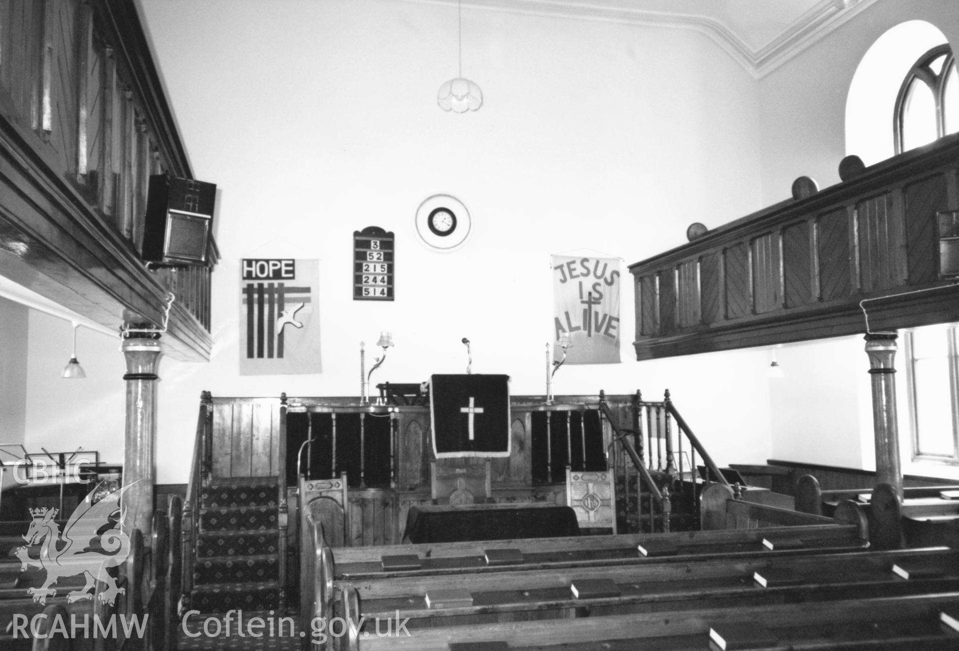 Digital copy of a black and white photograph showing an interior view of the Bethlehem English Baptist Chapel, Spittal, taken by Robert Scourfield, 1996.