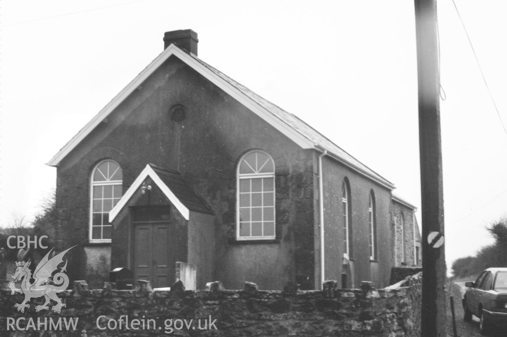 Digital copy of a black and white photograph showing an exterior view of Hill Mountain Wesleyan Methodist Chapel, Burton, taken by Robert Scourfield, 1996.