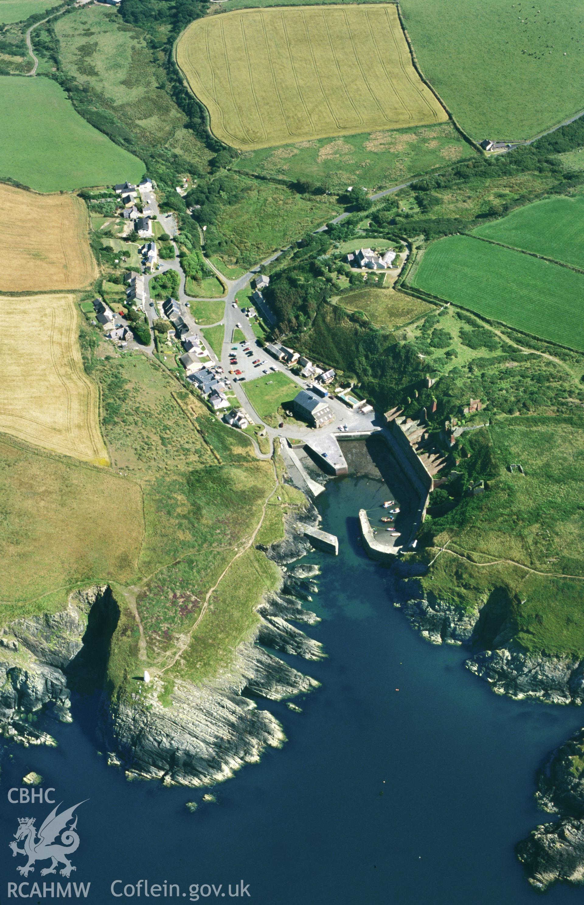 Slide of RCAHMW colour oblique aerial photograph of Porthgain Harbour and Brickworks, taken by T.G. Driver, 17/7/2000.