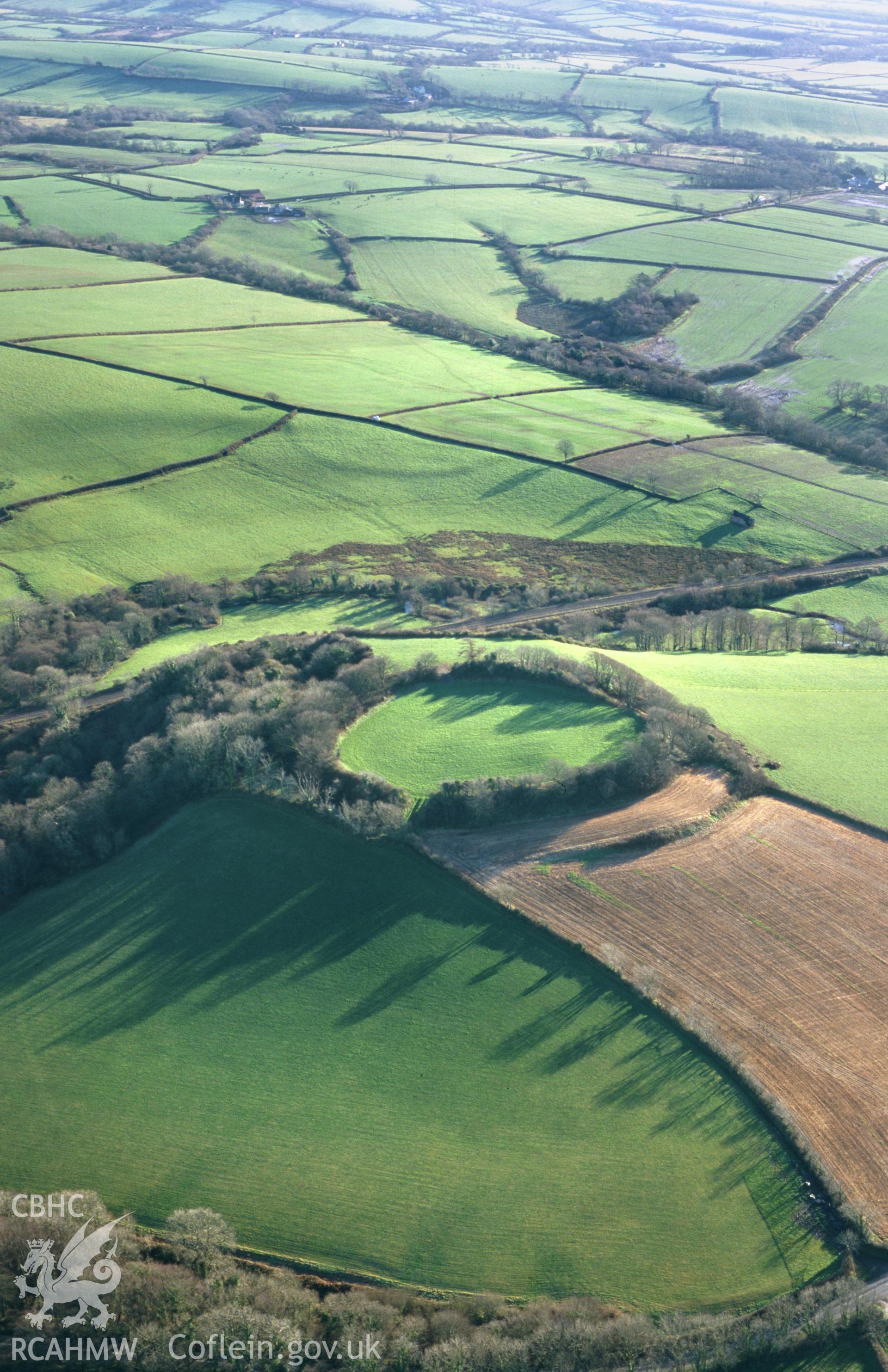 RCAHMW colour slide oblique aerial photograph of Rudbaxton Rath, taken on 19/12/1999 by Toby Driver