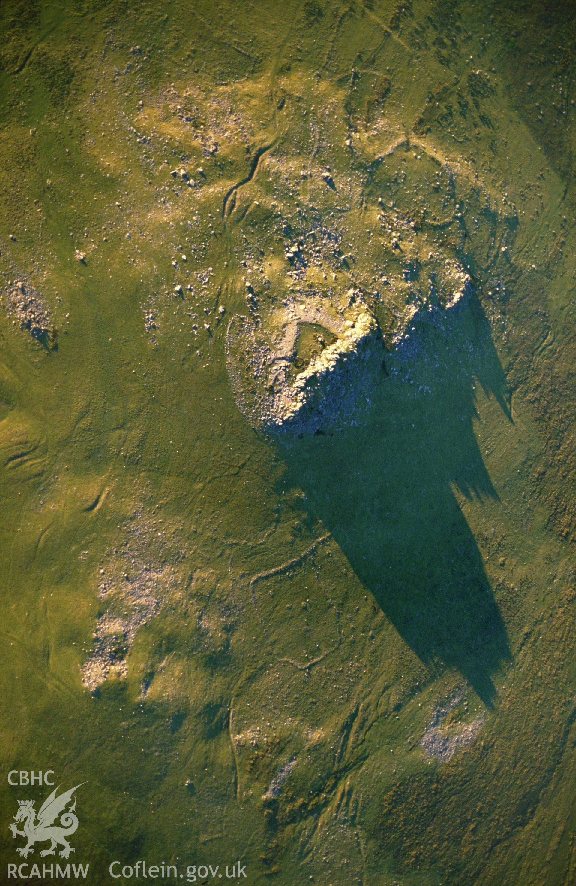 Slide of RCAHMW colour oblique aerial photograph of Carn Alw Hillfort, taken by C.R. Musson, 19/7/1990.