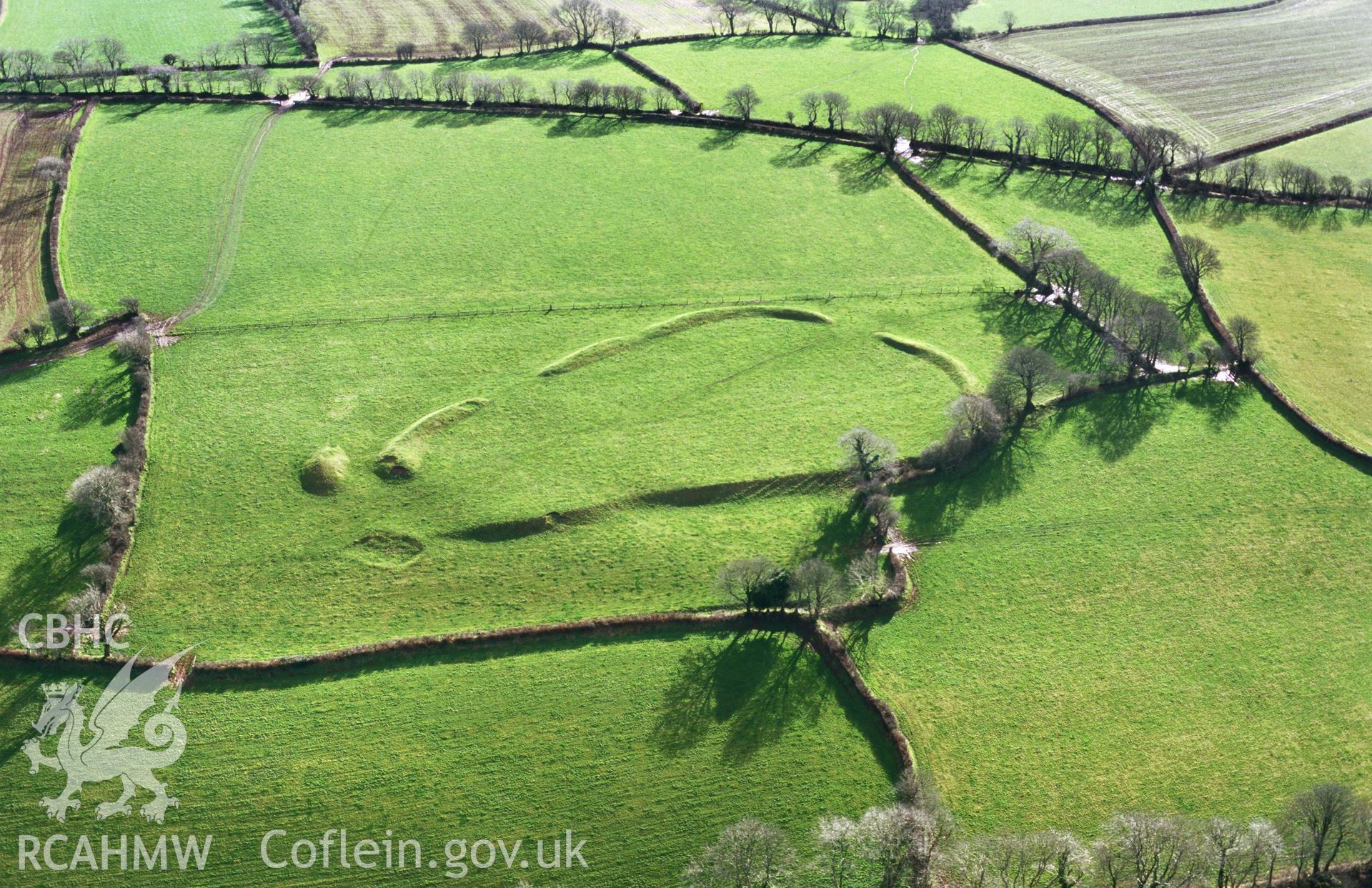 RCAHMW colour slide oblique aerial photograph of Molleston Back Enclosure; Grove Enclosure, Templeton, taken by T.G.Driver on the 21/02/2000