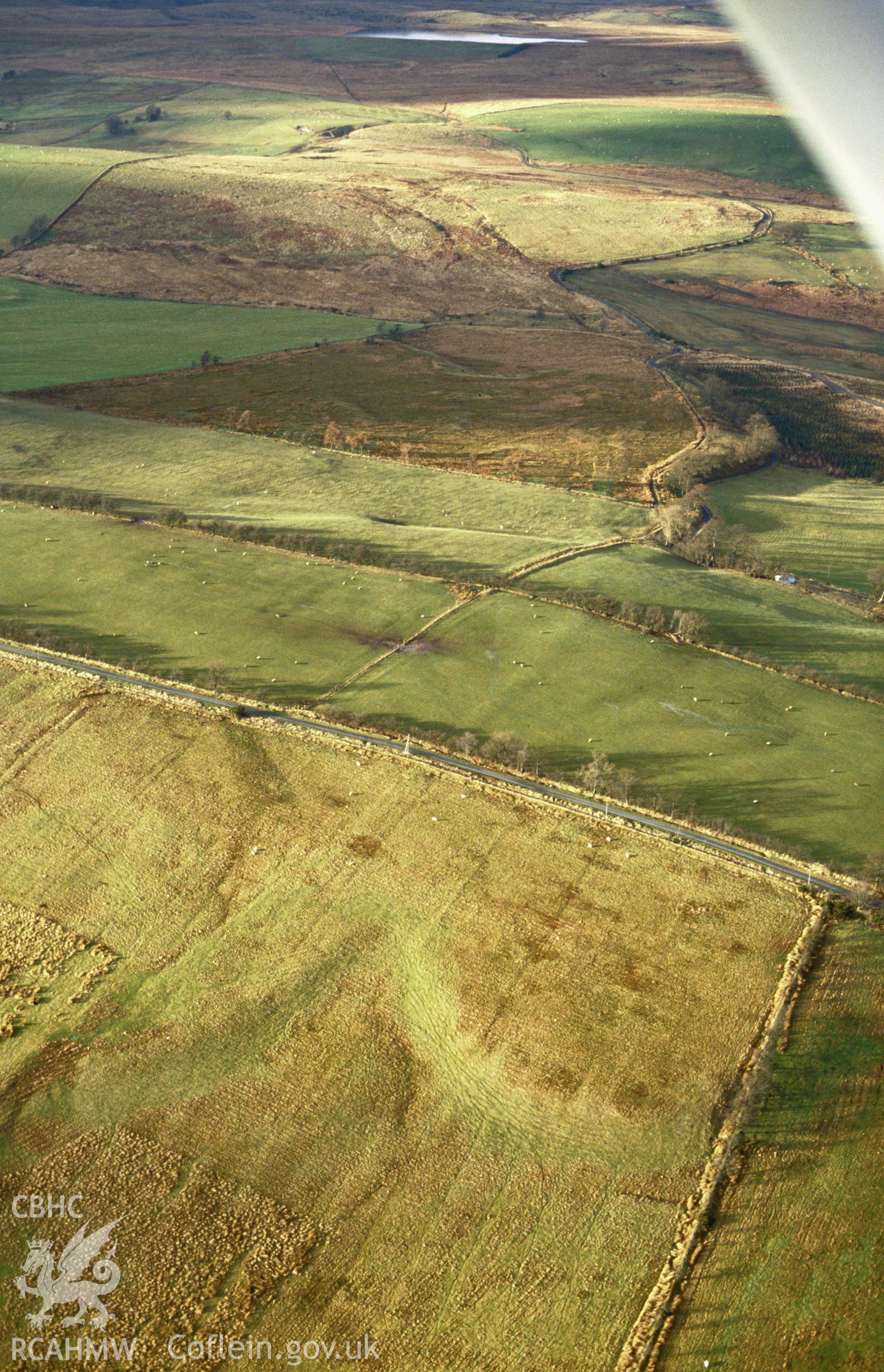 RCAHMW colour slide oblique aerial photograph of Pant-y-milwyr Roman Road, Llanfair Caereinion, taken by C.R. Musson, 07/01/94