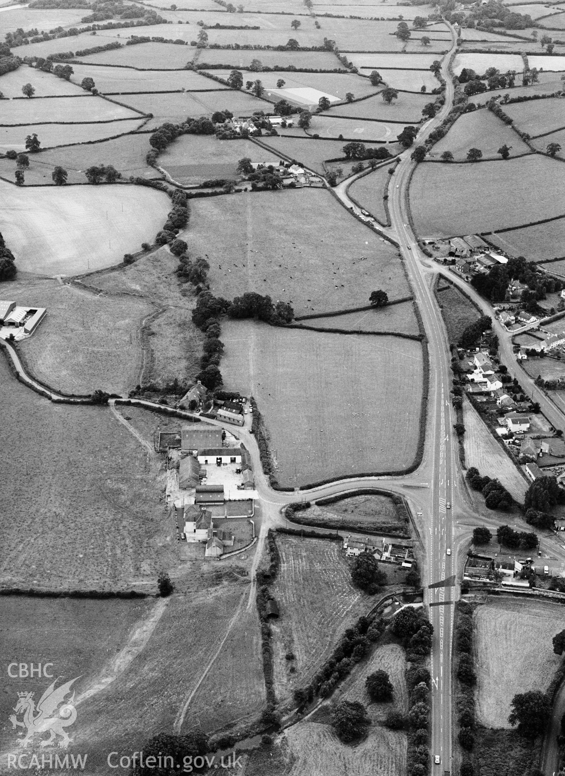 RCAHMW Black and white oblique aerial photograph of a segment of the Tywi Valley Roman Road south of Llanwrda, taken on 02/07/1992 by CR Musson