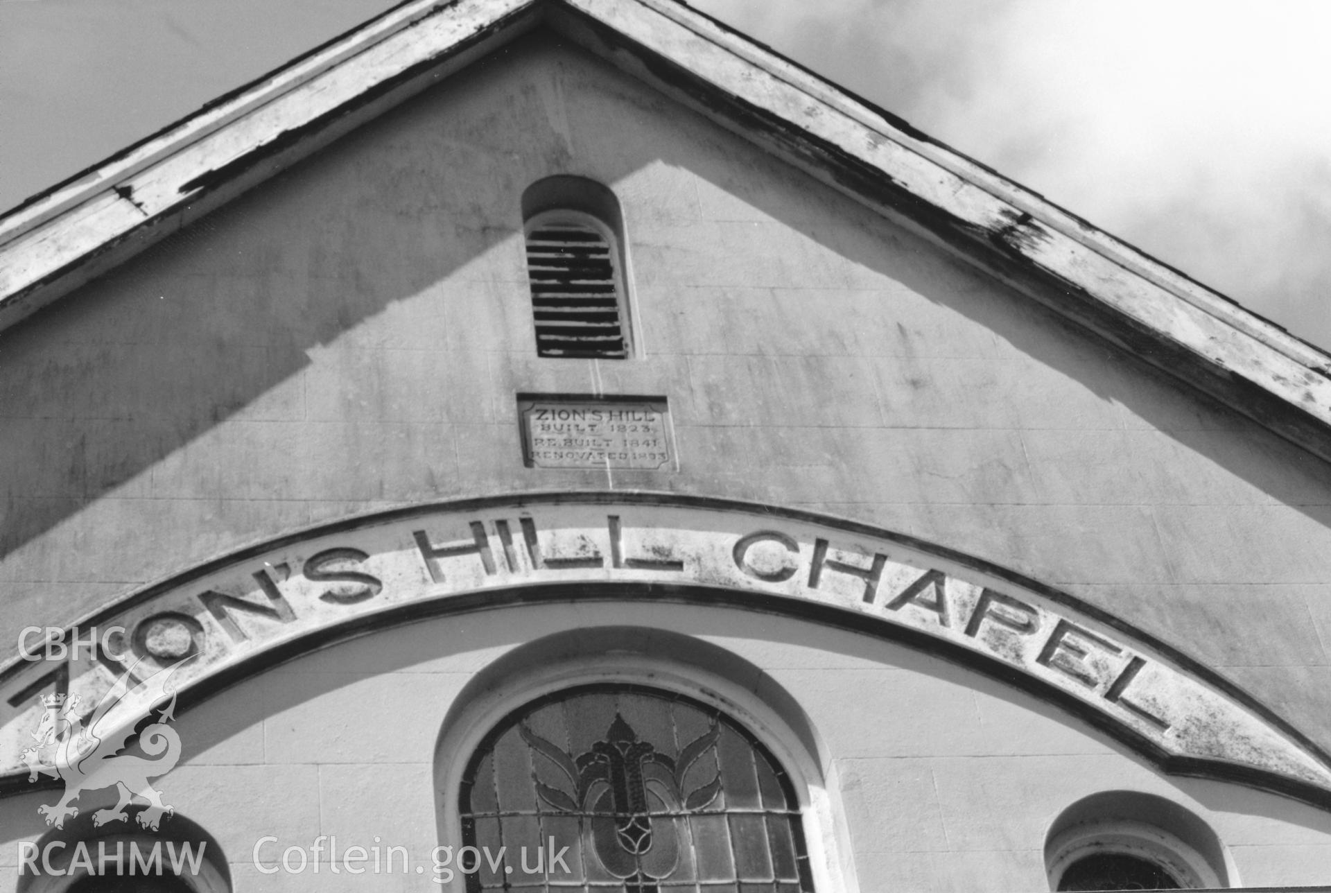 Digital copy of a black and white photograph showing detail of datestone at Zion Hill Congregational Chapel,  taken by Robert Scourfield, 1996.