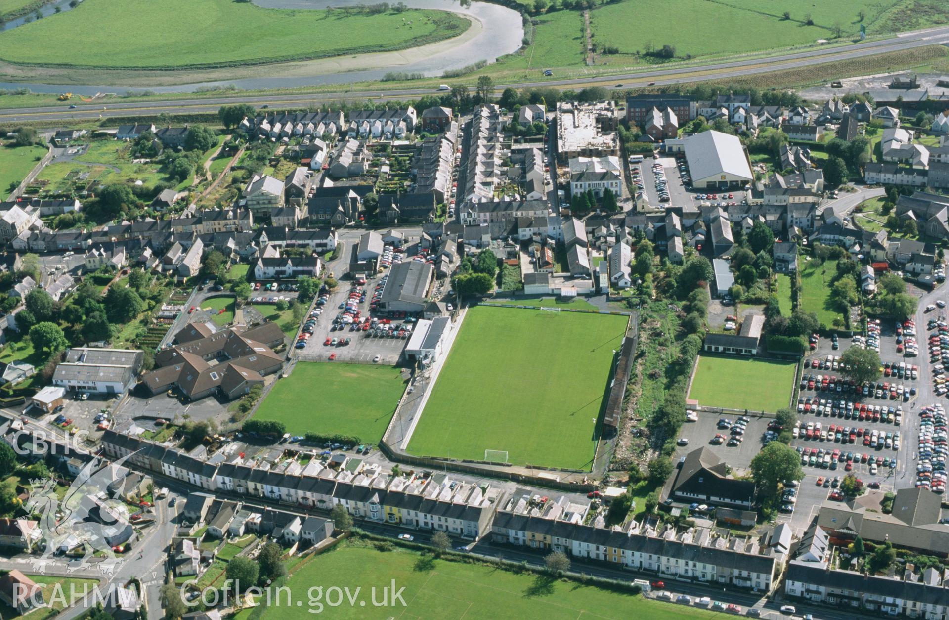 RCAHMW colour oblique aerial photograph of Carmarthen, Roman town, from north. Taken by Toby Driver on 03/10/2002