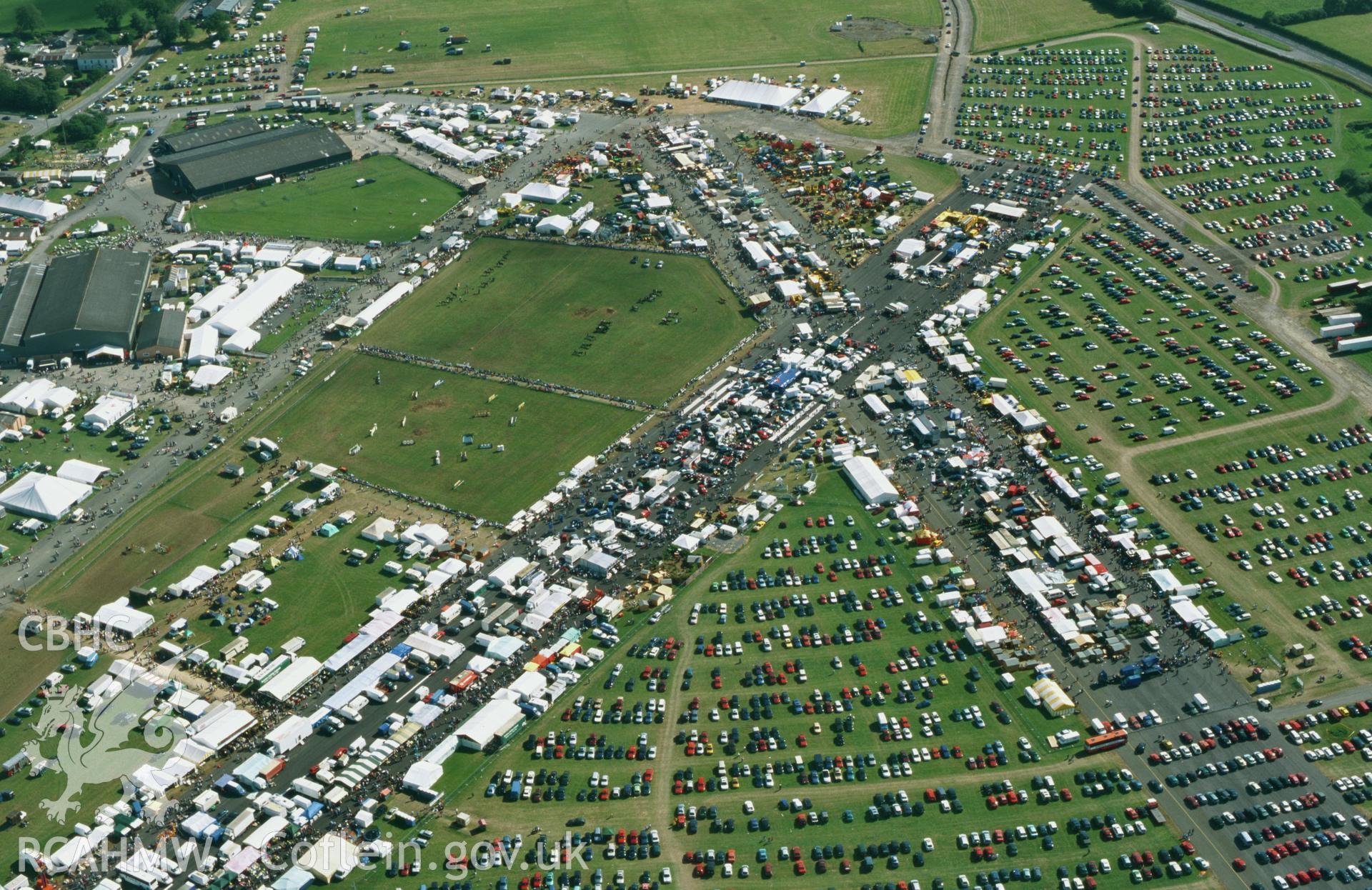 RCAHMW colour oblique aerial photograph of Haverfordwest airfield, with Pembrokeshire County Show in progress. Taken by Toby Driver on 15/08/2002