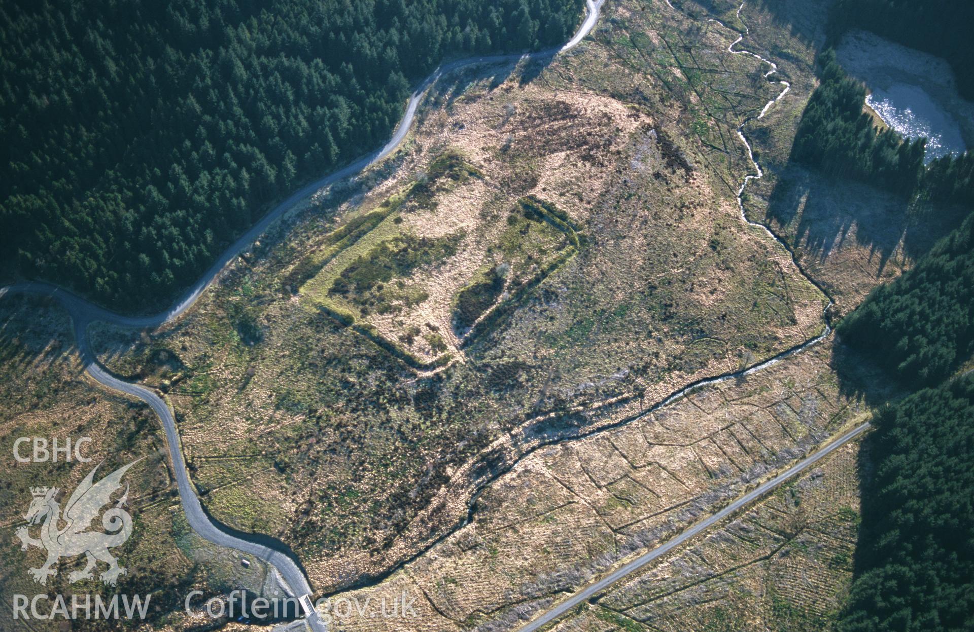 Slide of RCAHMW colour oblique aerial photograph of Cae Gaer, Mynydd y Ffynnon, taken by T.G. Driver, 2001.