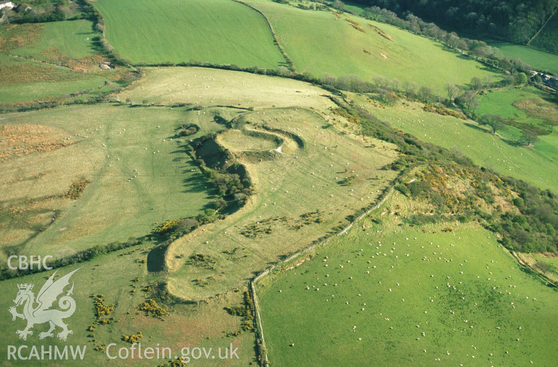 Slide of RCAHMW colour oblique aerial photograph of Caer Penrhos, Llanrhystud, taken by C.R. Musson, 1989.