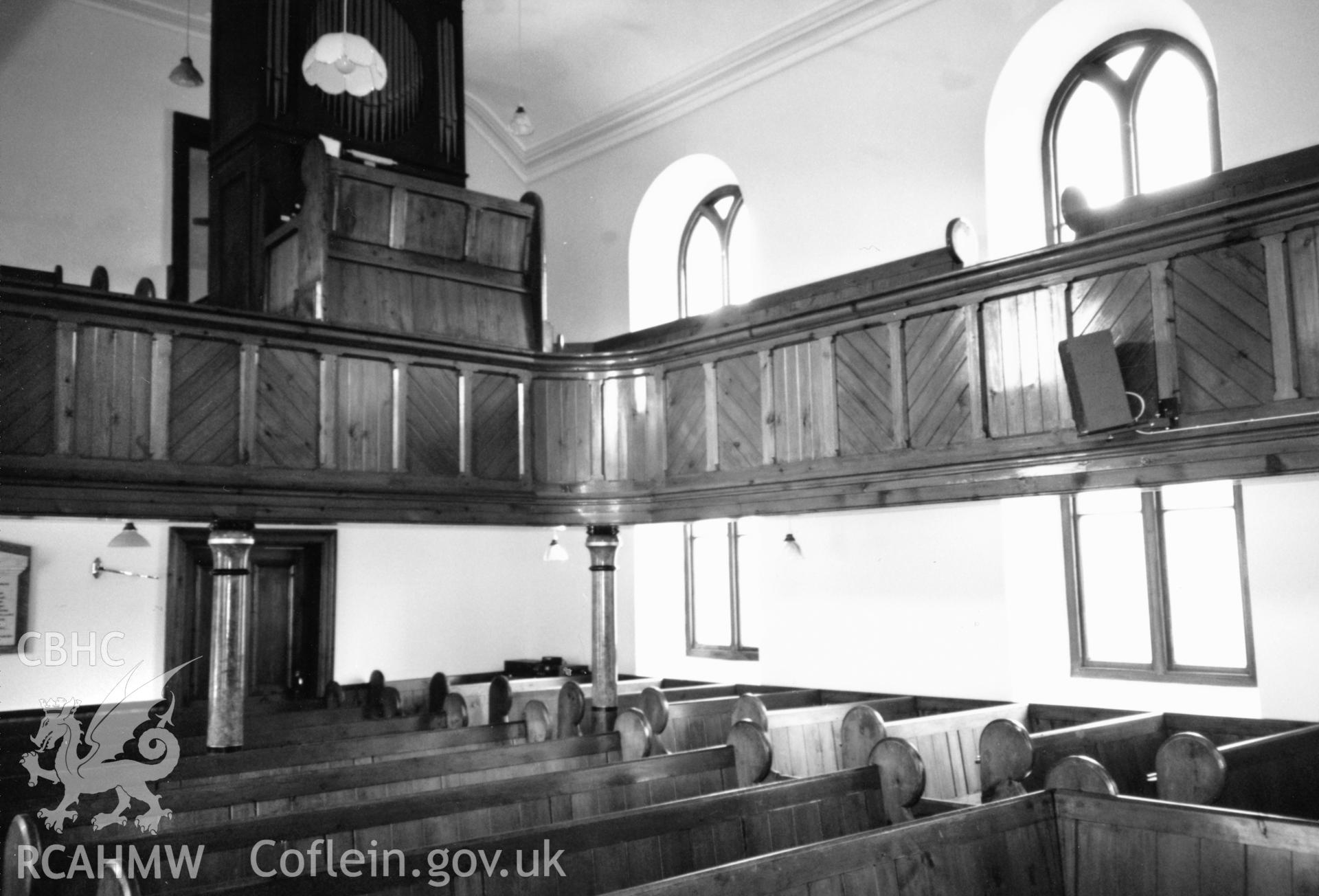 Digital copy of a black and white photograph showing an interior view of the Bethlehem English Baptist Chapel, Spittal, taken by Robert Scourfield, 1996.