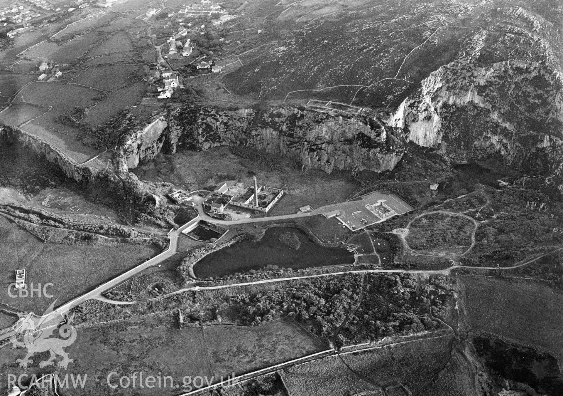 RCAHMW Black and white oblique aerial photograph of Breakwater Quarry and Brickworks, Holyhead, taken on 28/04/1999 by Toby Driver