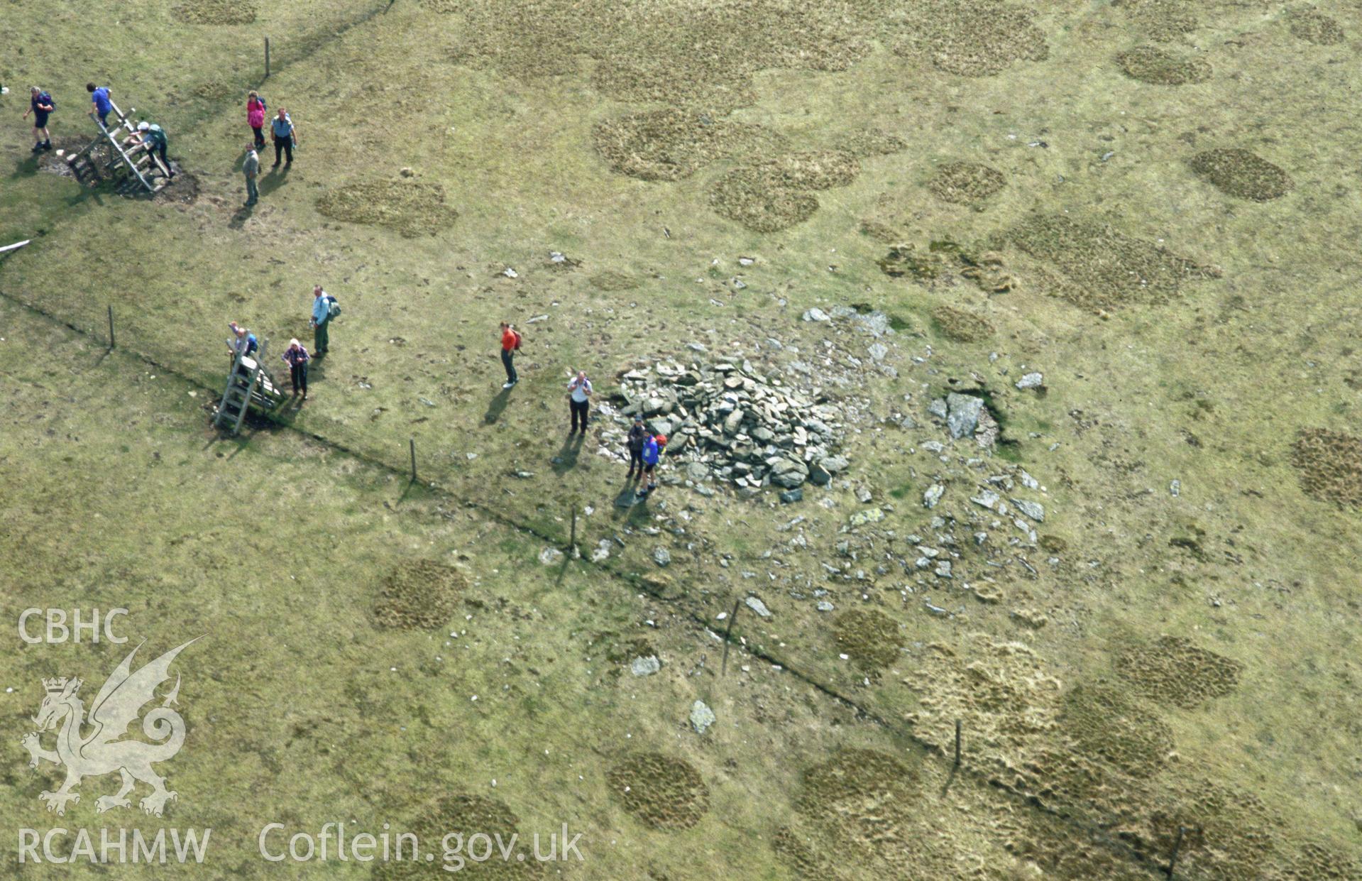 RCAHMW colour slide oblique aerial photograph of Moel Sych Cairn, Llanrhaeadr-ym-Mochnant, taken by C.R. Musson, 01/05/94