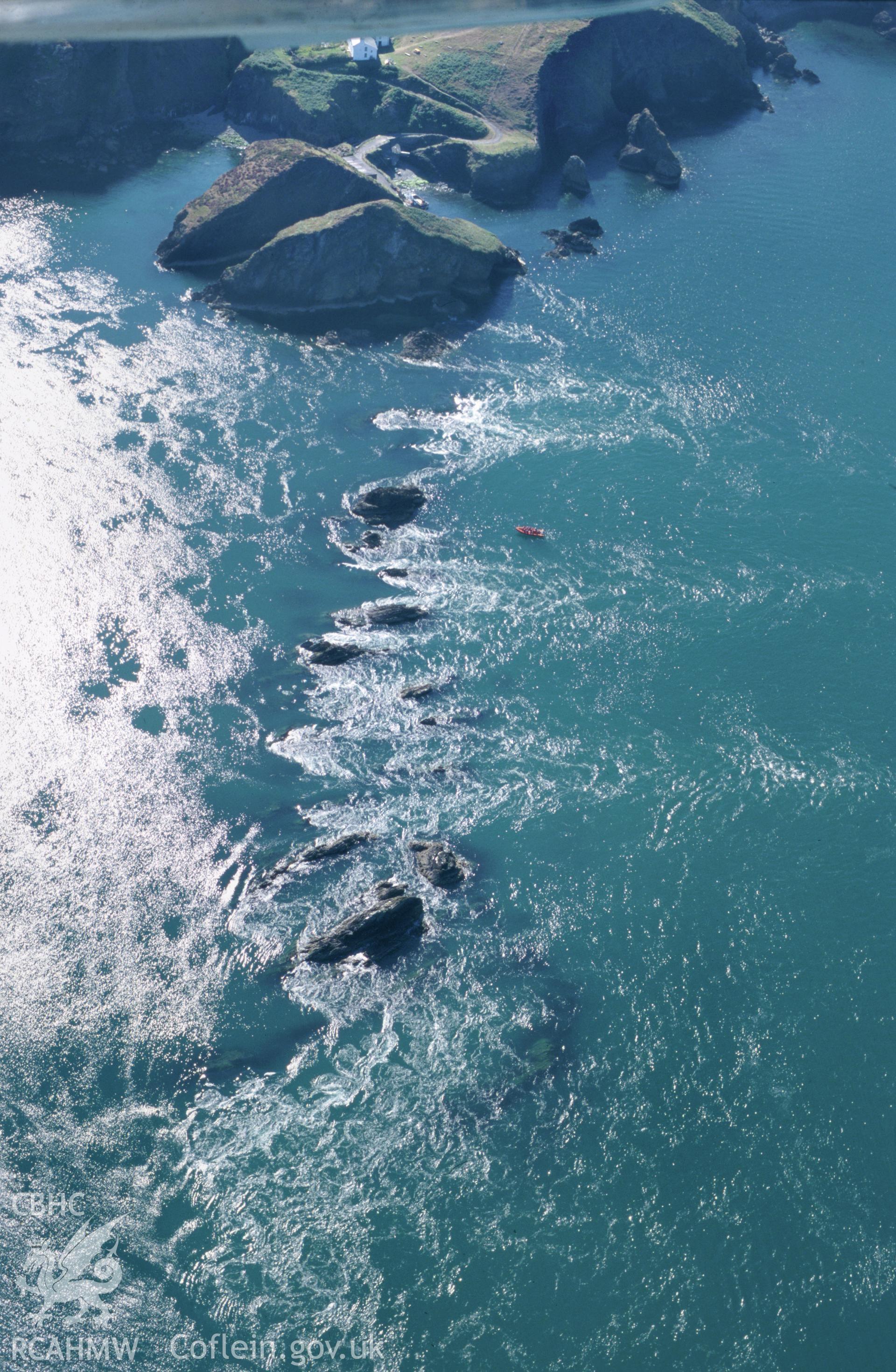 RCAHMW colour slide oblique aerial photograph of Ramsey Island Farm, St Davids and the Cathedral Close, taken by T.G.Driver on the 17/07/2000