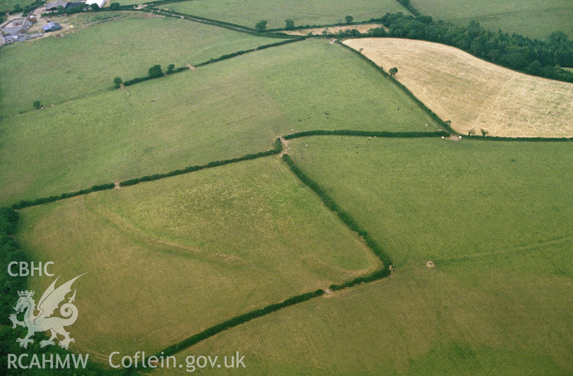 Slide of RCAHMW colour oblique aerial photograph of Broadway Enclosure, Llawhaden, taken by C.R. Musson, 1989.