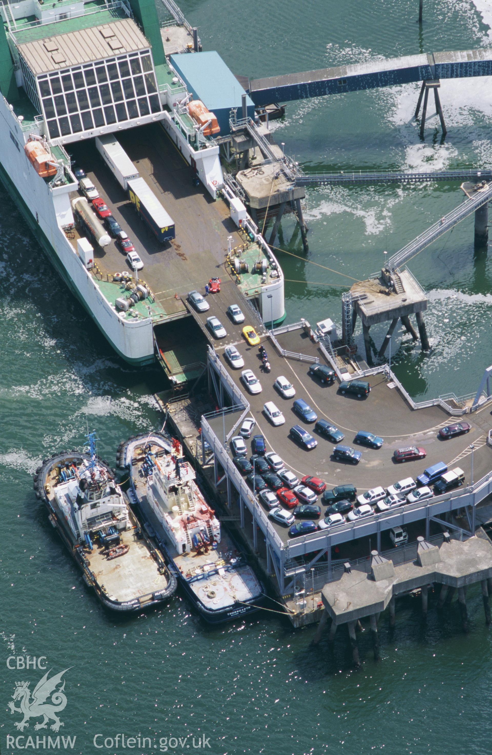 RCAHMW colour oblique aerial photograph of the Ferry Terminal at Pembroke Dock taken on 13/06/2003 by Toby Driver