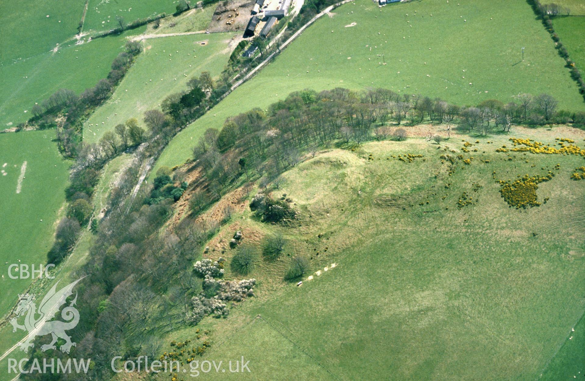 Slide of RCAHMW colour oblique aerial photograph of Catell Tan y Castell, Aberystwyth, taken by C.R. Musson, 1989.