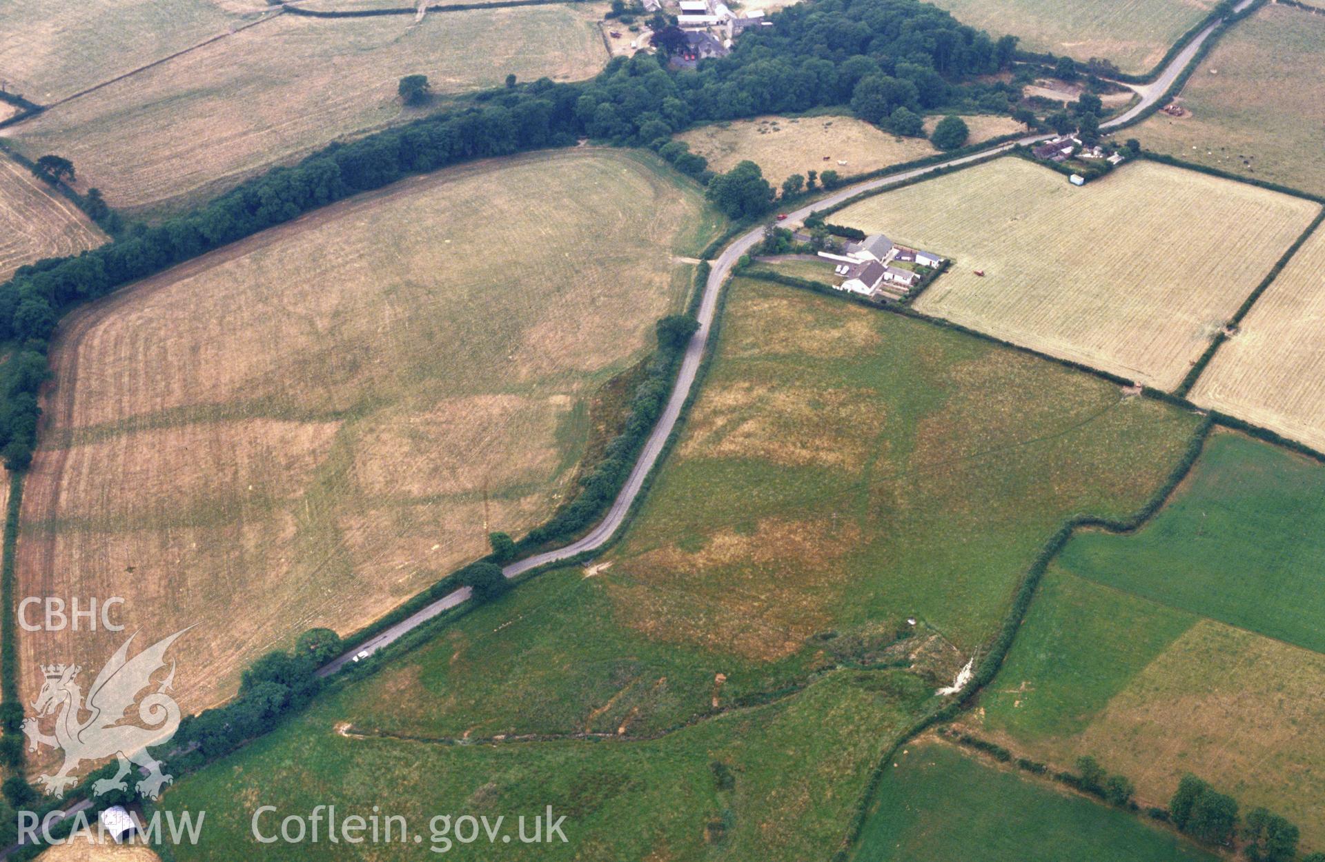 RCAHMW colour slide oblique aerial photograph of possible settlement features near Great Vaynor, Llawhaden, taken on 29/06/1992 by CR Musson