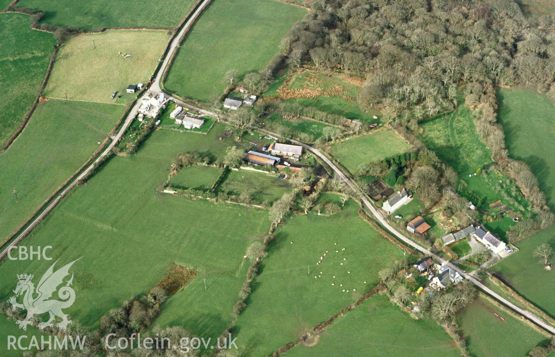 Slide of RCAHMW colour oblique aerial photograph of earthworks at Landshipping House, Martletwy, taken by C.R. Musson, 1993.