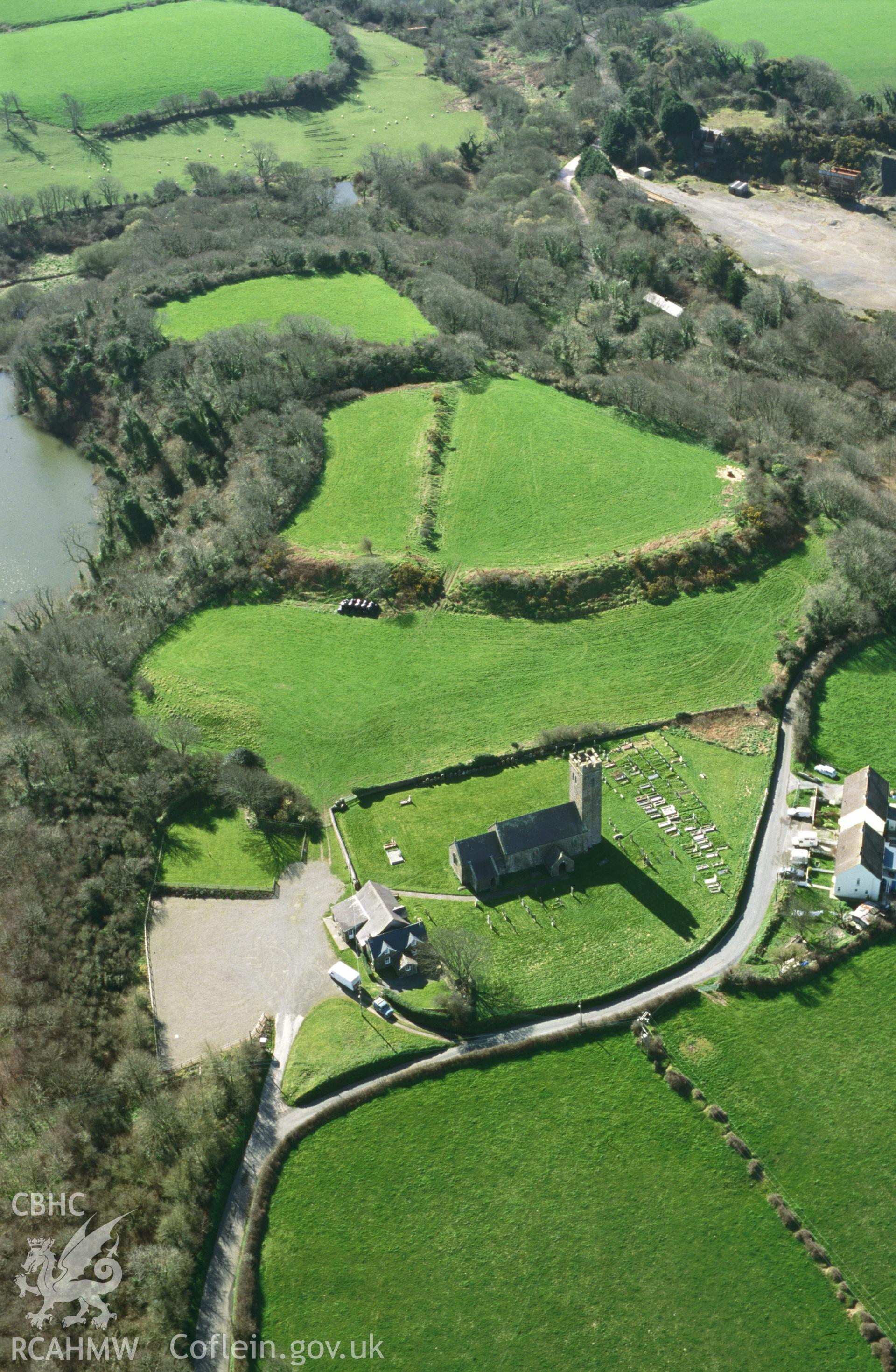 Slide of RCAHMW colour oblique aerial photograph of aerial view of St James' Church, Walwyn's Castle, taken by Toby Driver, 2002.