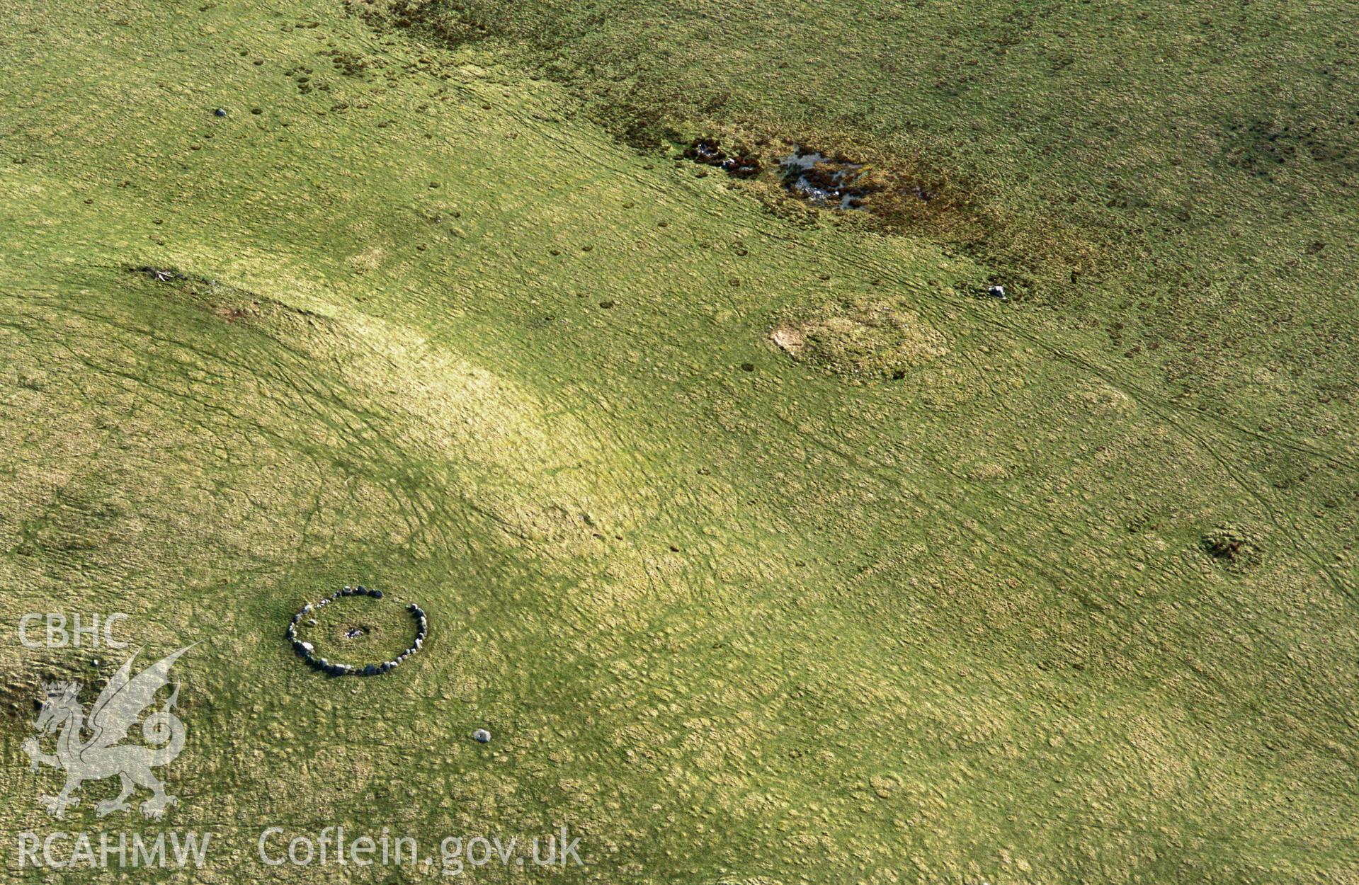 RCAHMW colour slide aerial photograph of Moel Ty Uchaf, E. of Llandrillo. Taken by C R Musson on 13/03/1995