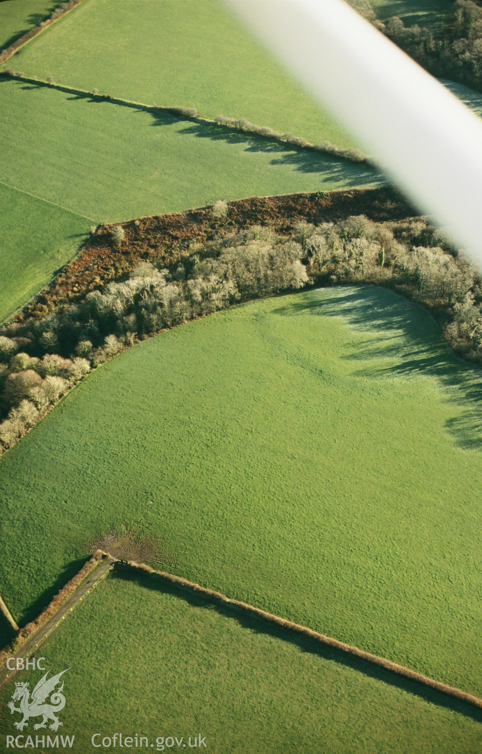 RCAHMW colour slide oblique aerial photograph of Plenty Parc Rath, Spittal, taken on 19/12/1999 by Toby Driver