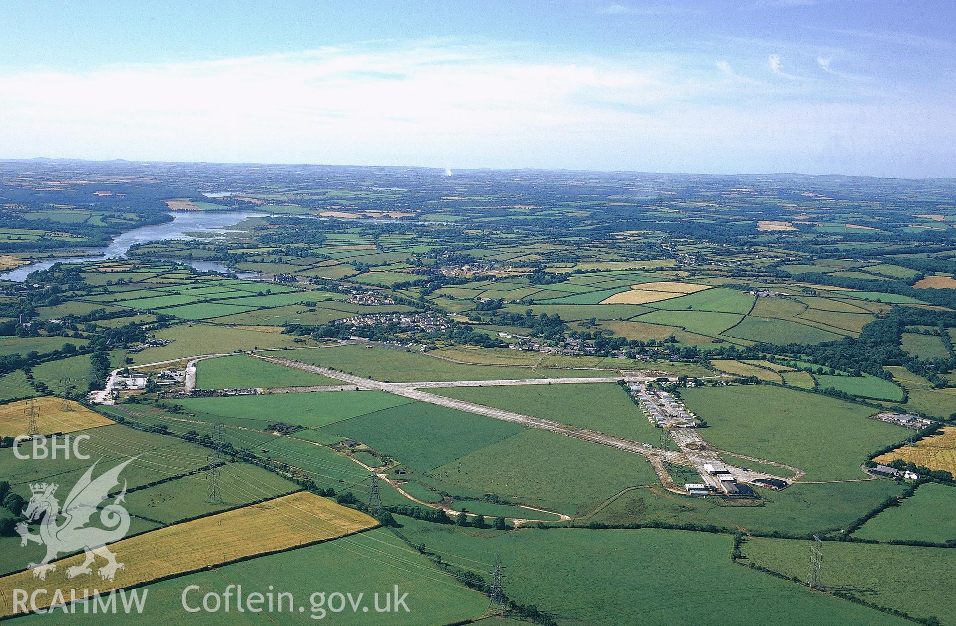 RCAHMW colour oblique aerial photograph of Sageston airfield; view fron south-east. Taken by C R Musson on 24/07/1995