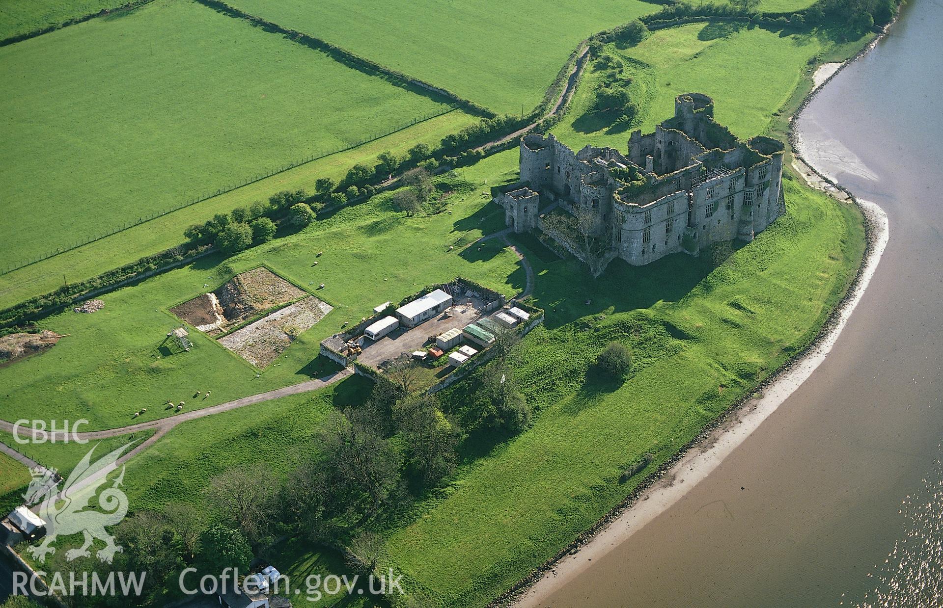 RCAHMW colour oblique aerial photograph of Carew Castle and area. Taken by C R Musson 1989