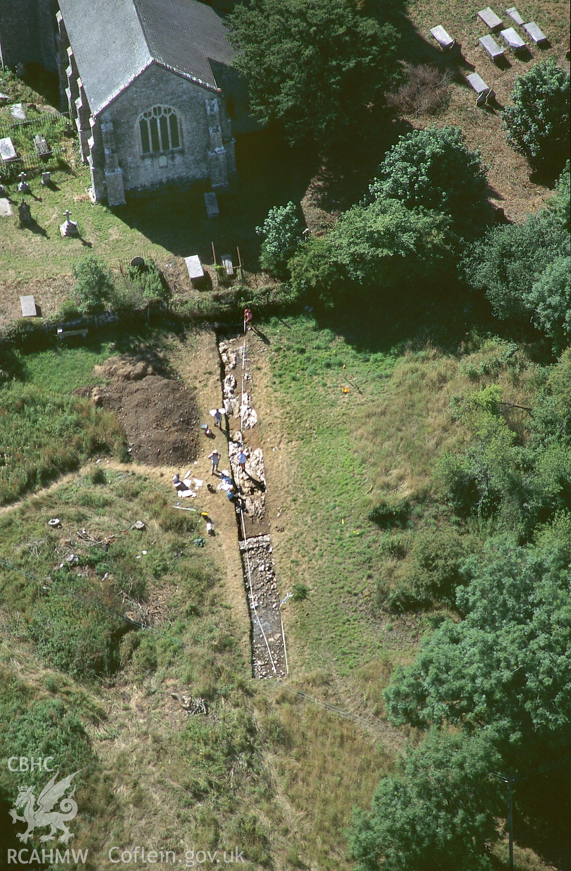 RCAHMW colour oblique aerial photograph of Carew Cheriton church excavations; overhead view. Taken by C R Musson on 24/07/1995