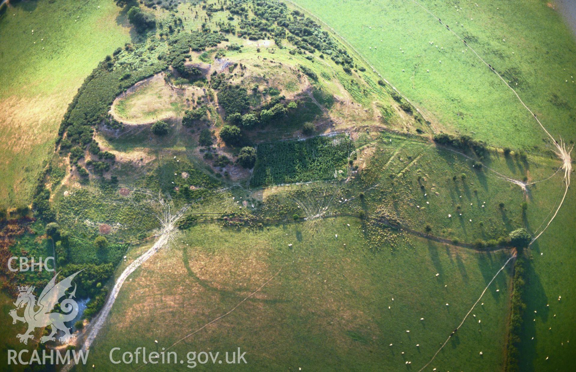 Slide of RCAHMW colour oblique aerial photograph of Pen y Castell, Llanilar, taken by C.R. Musson, 1990.