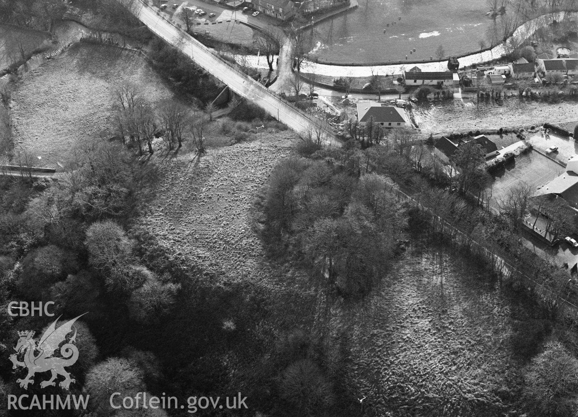 RCAHMW Black and white oblique aerial photograph of Wolfscastle Castle, Wolfscastle, taken by C.R. Musson, 02/03/94