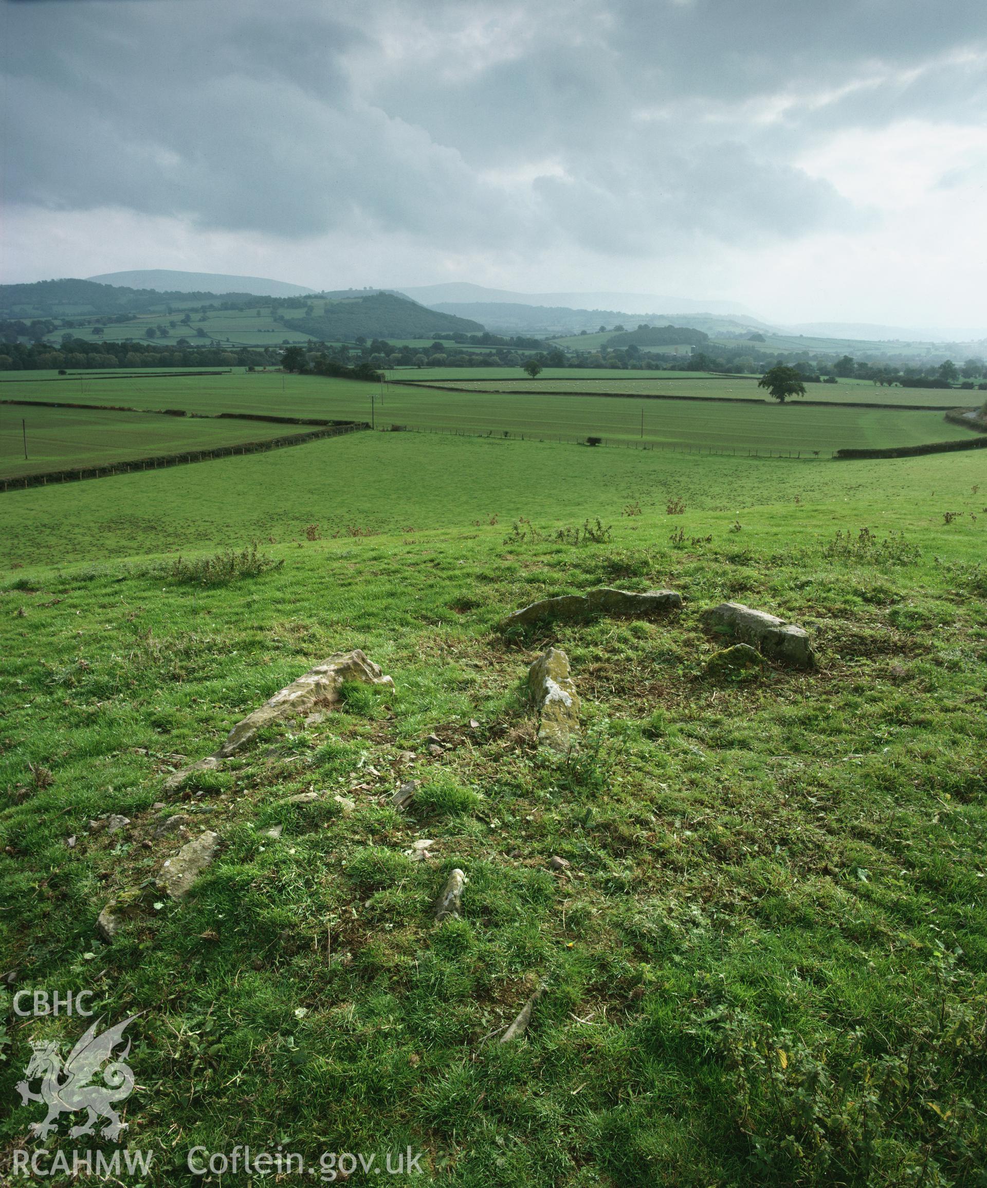 Colour transparency showing a view of chambered cairn at Clyro Court Farm, produced by Iain Wright, c.1981