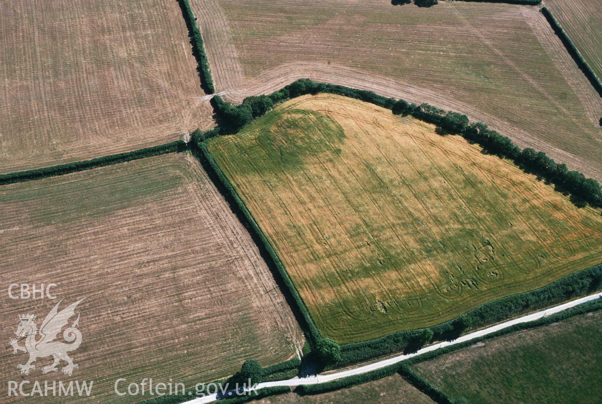 RCAHMW colour slide oblique aerial photograph of Drim Camp, Llawhaden, taken by C.R.Musson on the 25/07/1996