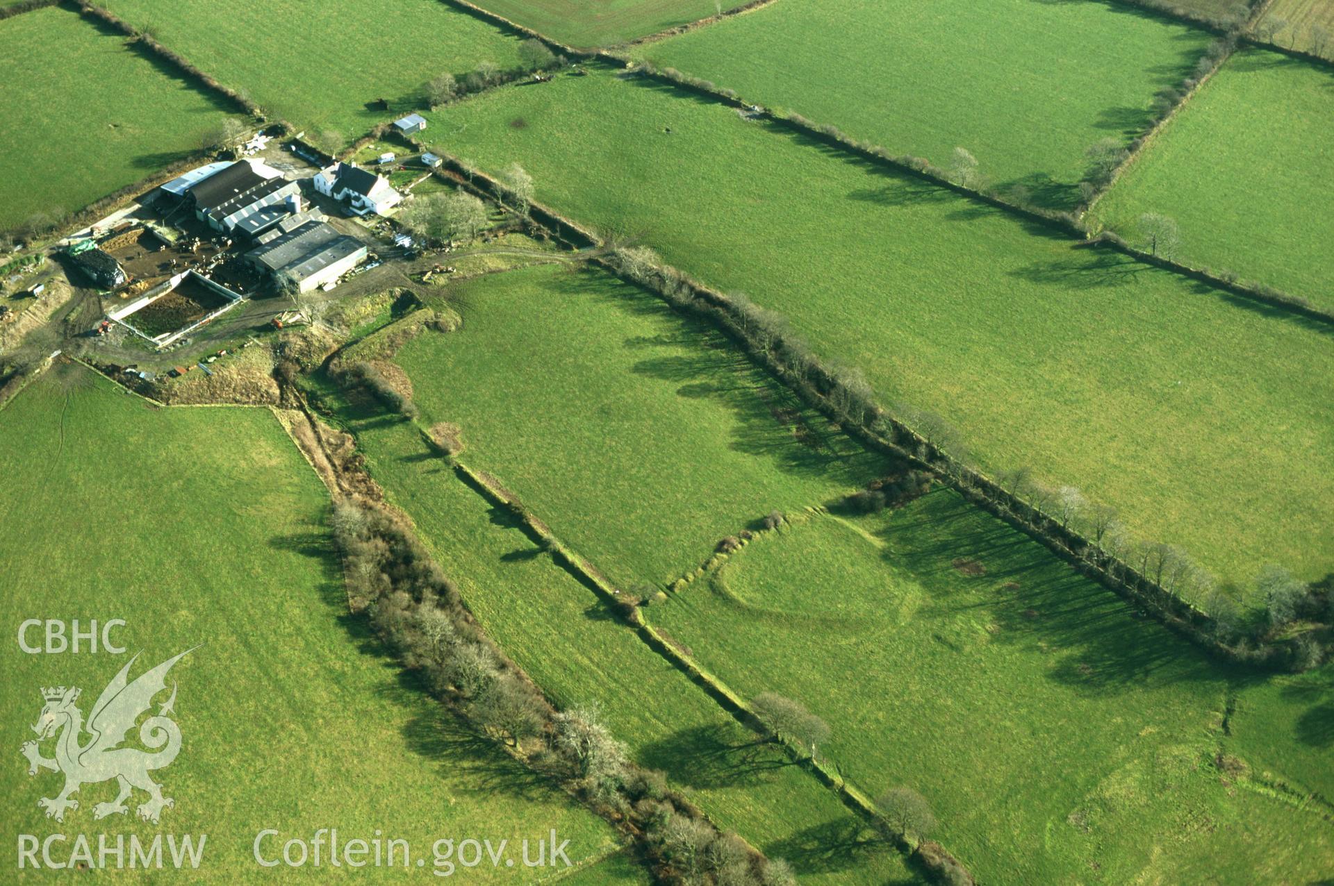 RCAHMW colour slide oblique aerial photograph of Velindre, Enclosure, Llys-y-Fran, New Moat, taken by C.R.Musson on the 07/02/1997