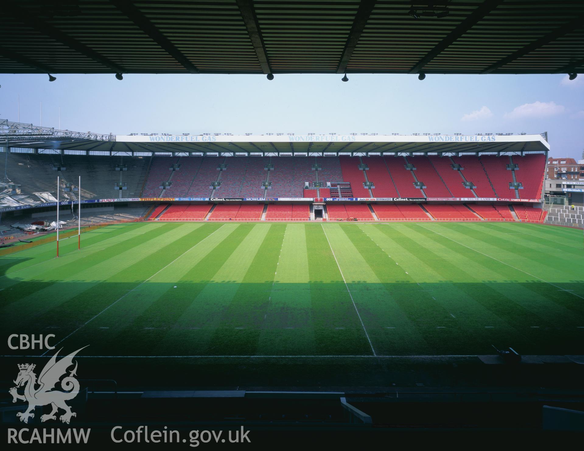 Colour transparency showing a view of the pitch and seating at Cardiff Arms Park, produced by Iain Wright 1997