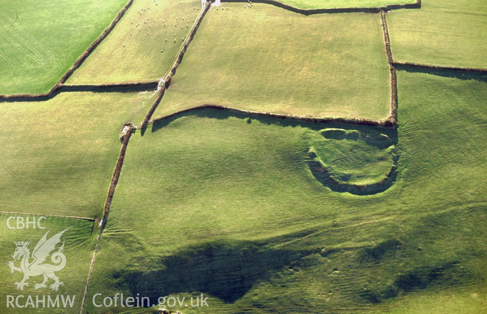 Slide of RCAHMW colour oblique aerial photograph of Ford Camp, Wolfscastle,  taken by Toby Driver, 2004.