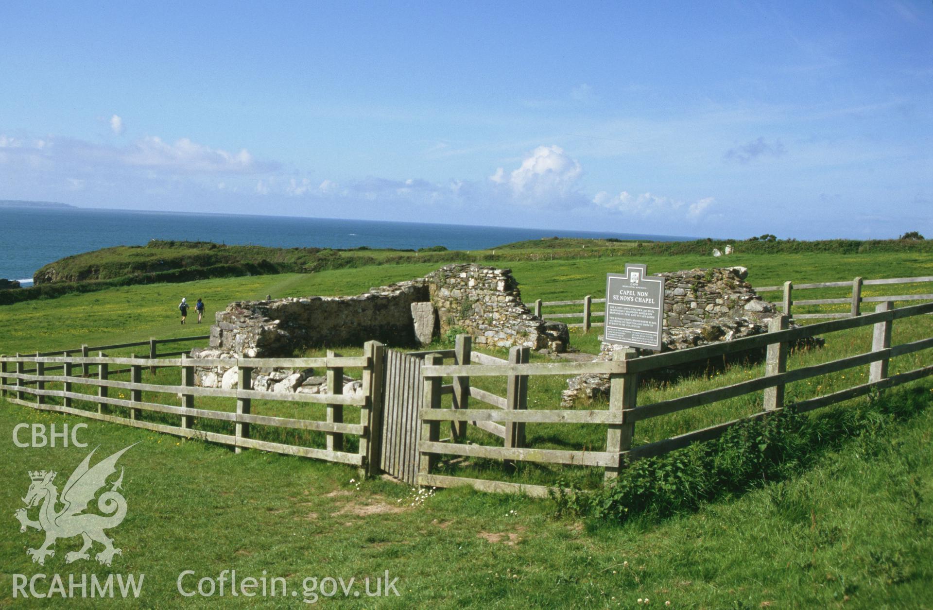 RCAHMW colour oblique ground photograph showing the ruins of St Non's Chapel, St Davids , taken by Toby Driver, 2006.