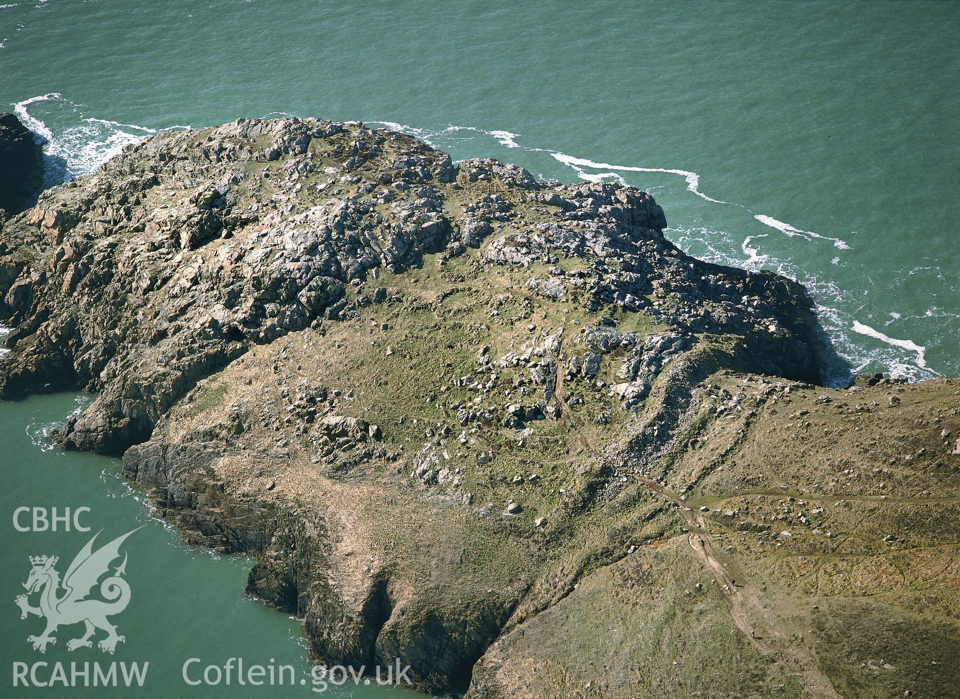 RCAHMW colour oblique aerial photograph of St David's Head Camp, taken by C R Musson, 1991.