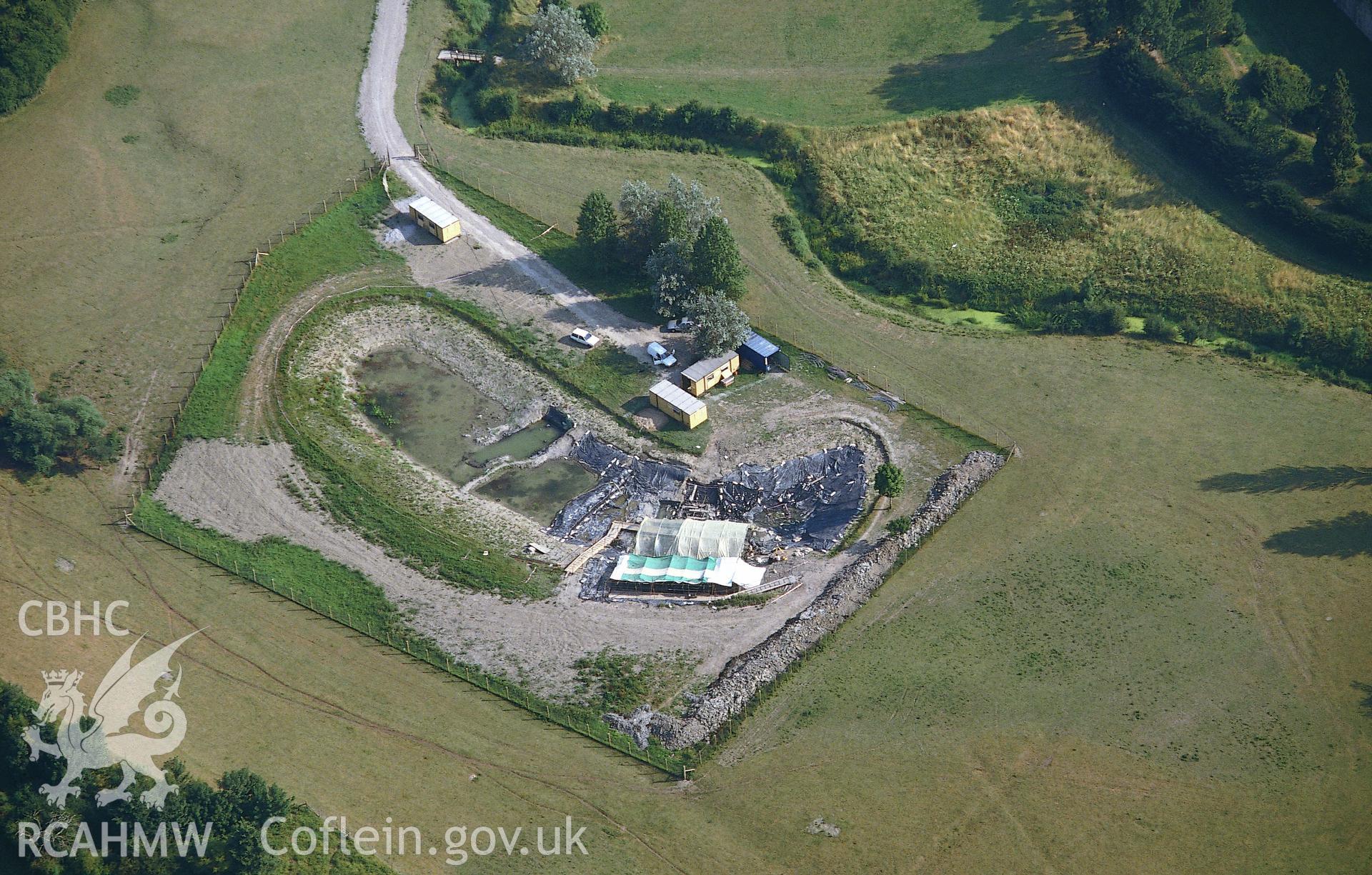 RCAHMW colour slide oblique aerial photograph of Caldicot Castle Lake, taken  by CR Musson, 1990.