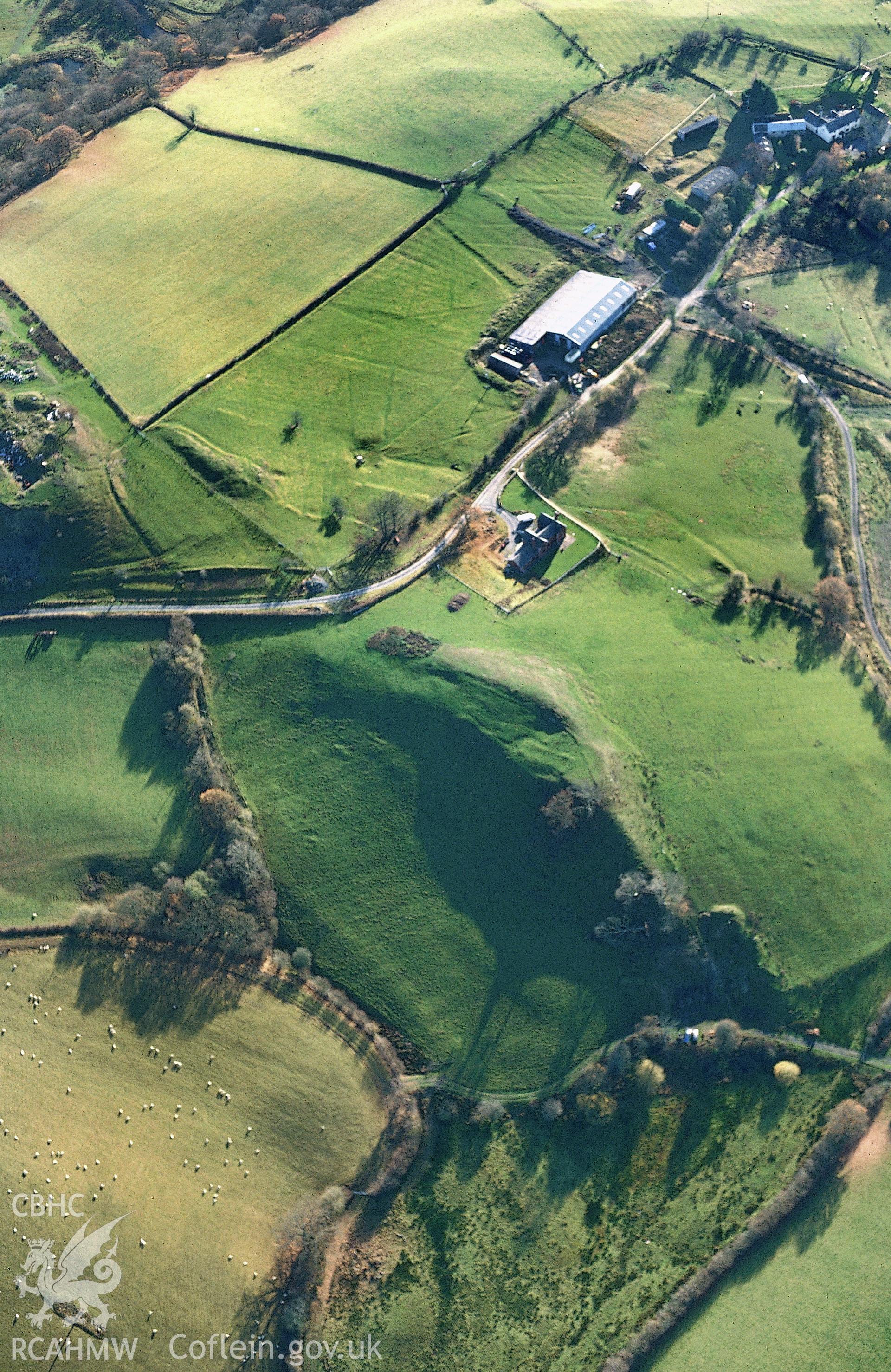 Slide of RCAHMW colour oblique aerial photograph of Cefn Llys Hillfort in winter, taken by T.G. Driver, 2003.