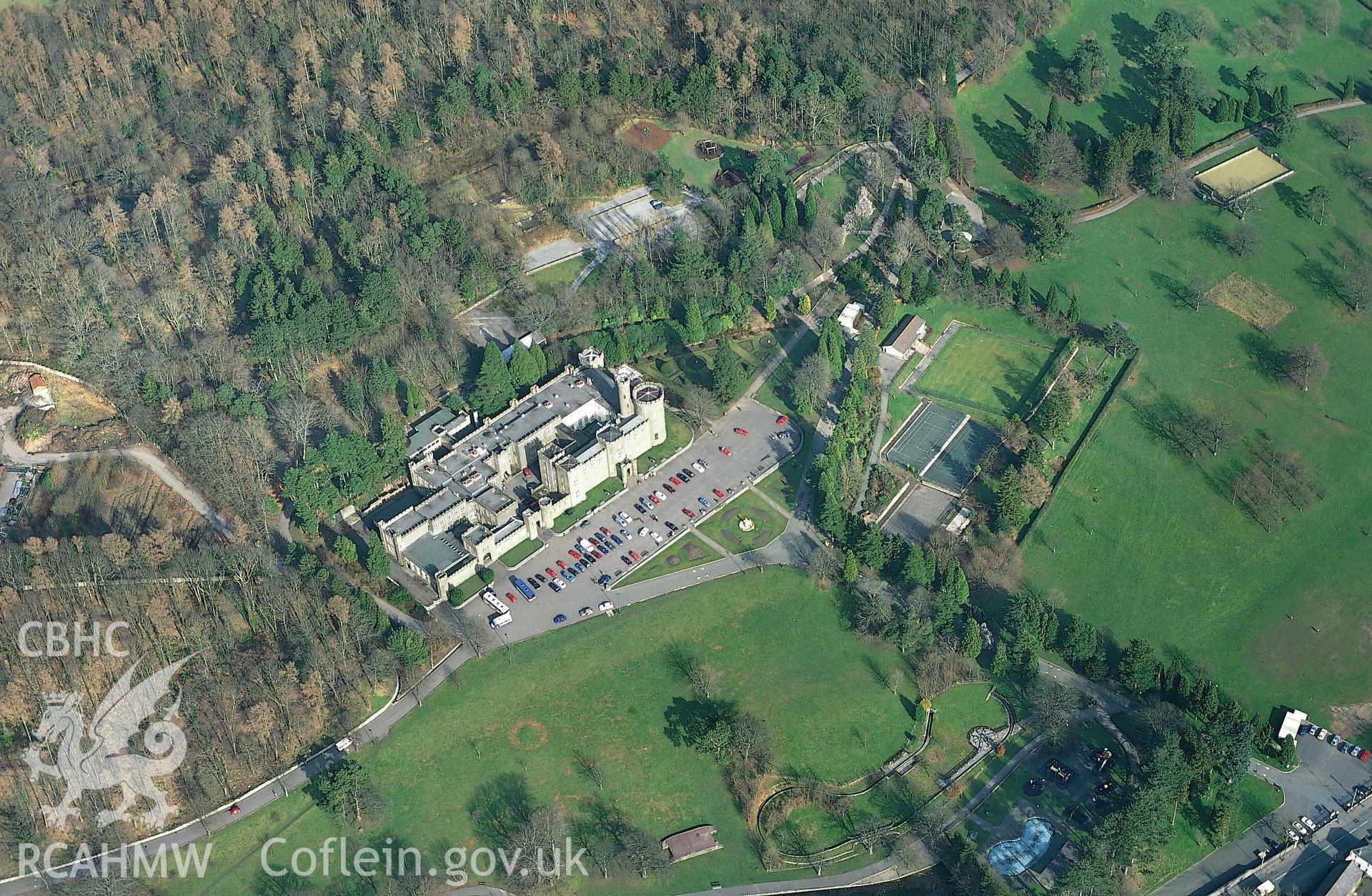 RCAHMW colour slide oblique aerial photograph of Cyfarthfa Castle, Merthyr Tydfil, taken on 15/03/1999 by Toby Driver