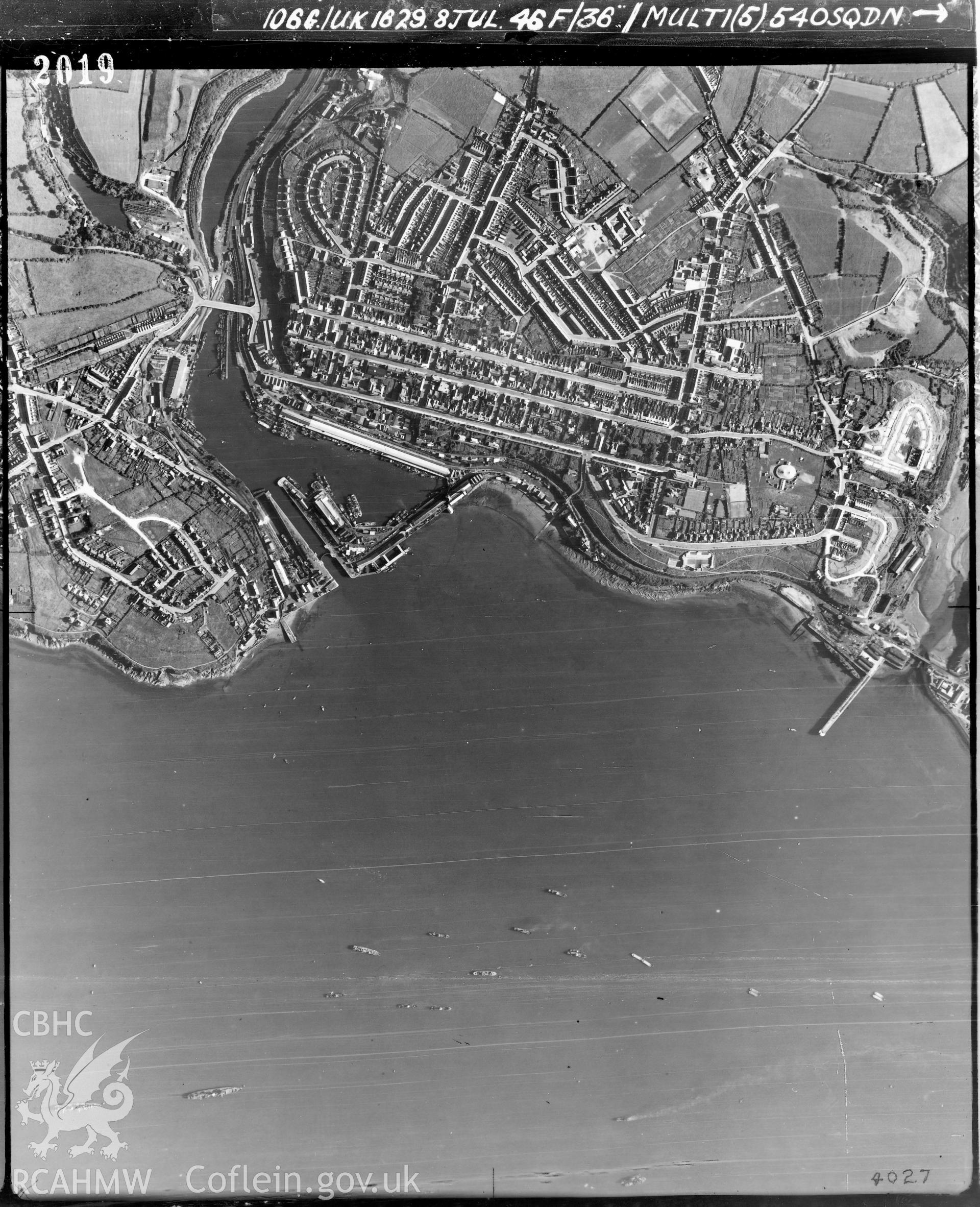 Black and white vertical aerial photograph taken by the RAF on 08/07/1946 centred on SM90500548 at a scale of 1:10000, showing Milford Haven Town and Hubberston Port.