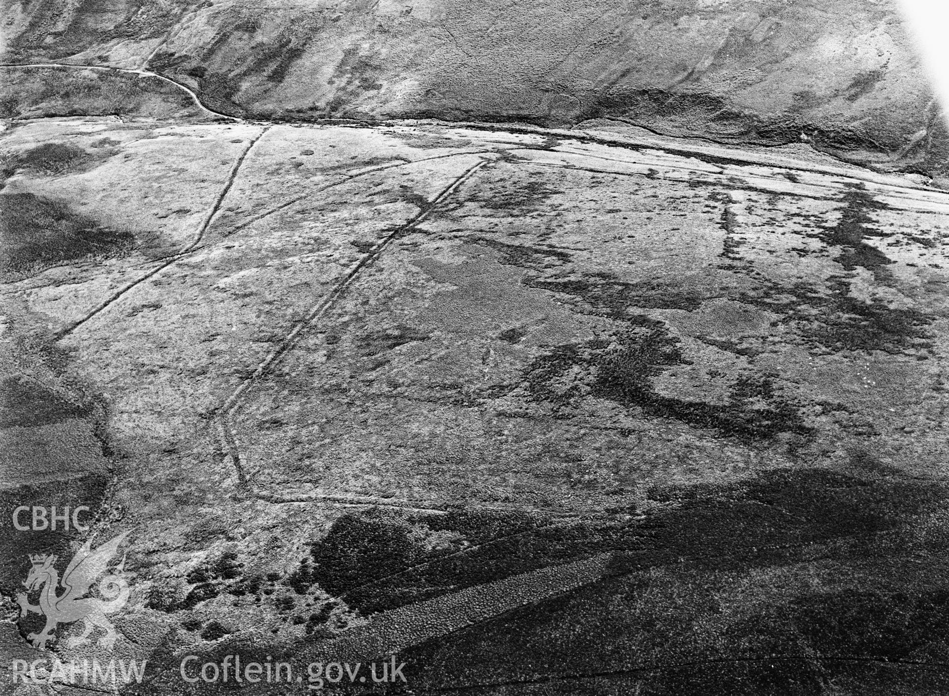 RCAHMW black and white oblique aerial photograph of Pen Plaenau Roman camp taken on 18 July 2003.
