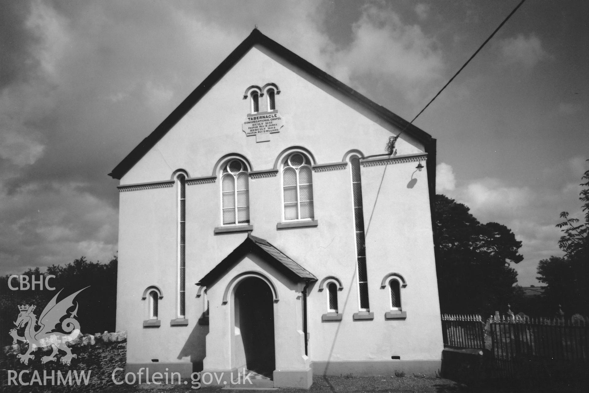 Digital copy of a black and white photograph showing a general view of Tabernacle Independent Chapel, Maenclochog, taken by Robert Scourfield, 1996.